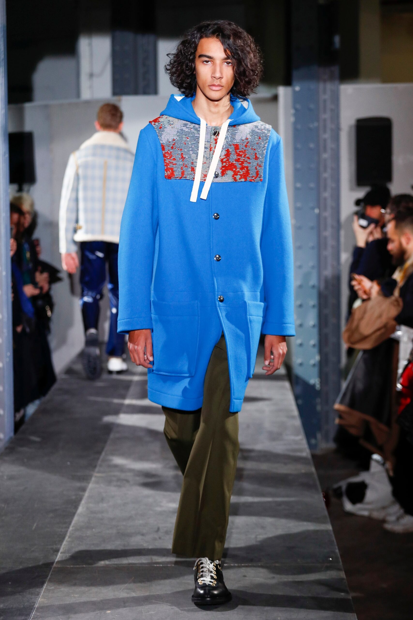 blue hooded coat with green pants