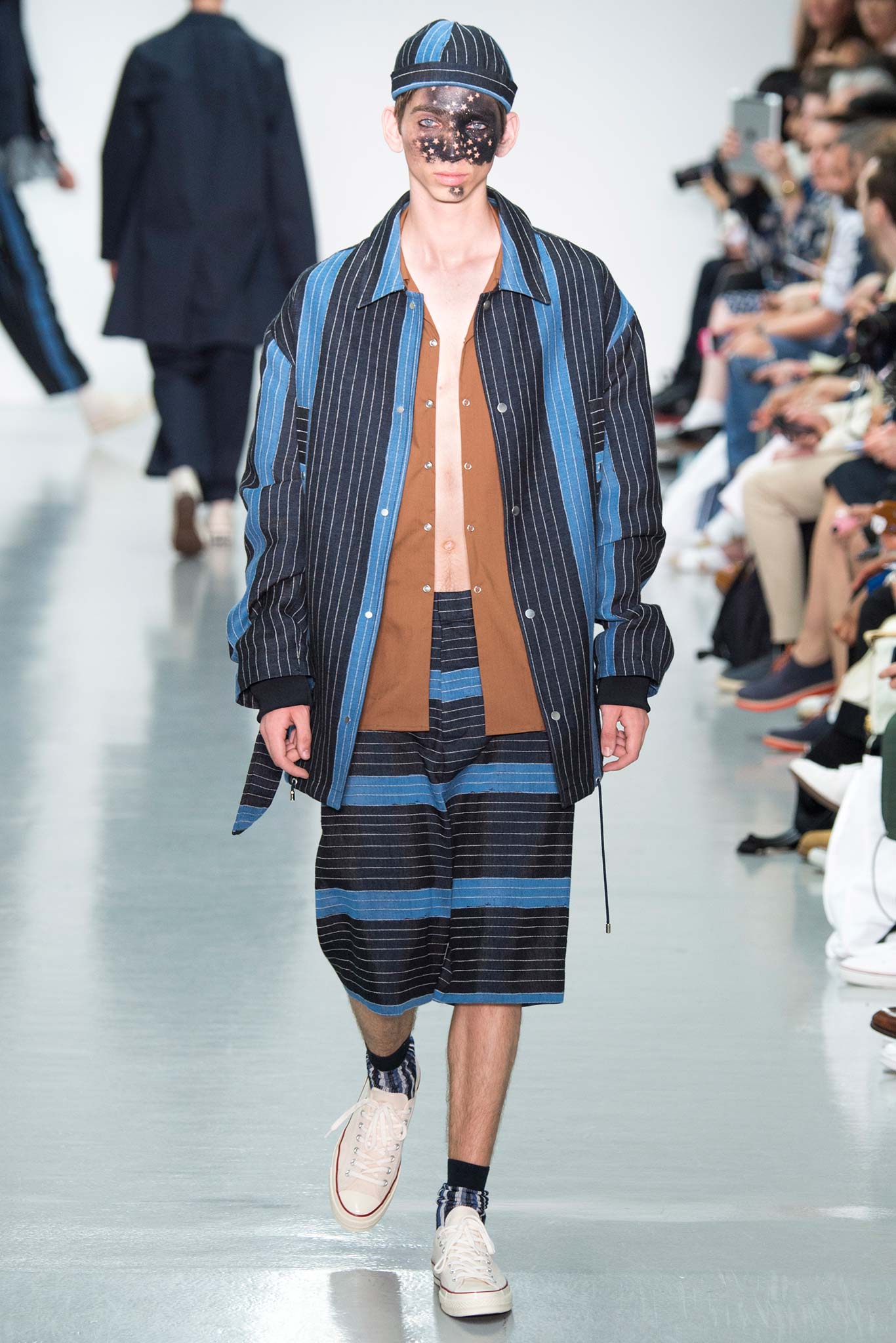 relaxed brown shirt with oversized blue jacket