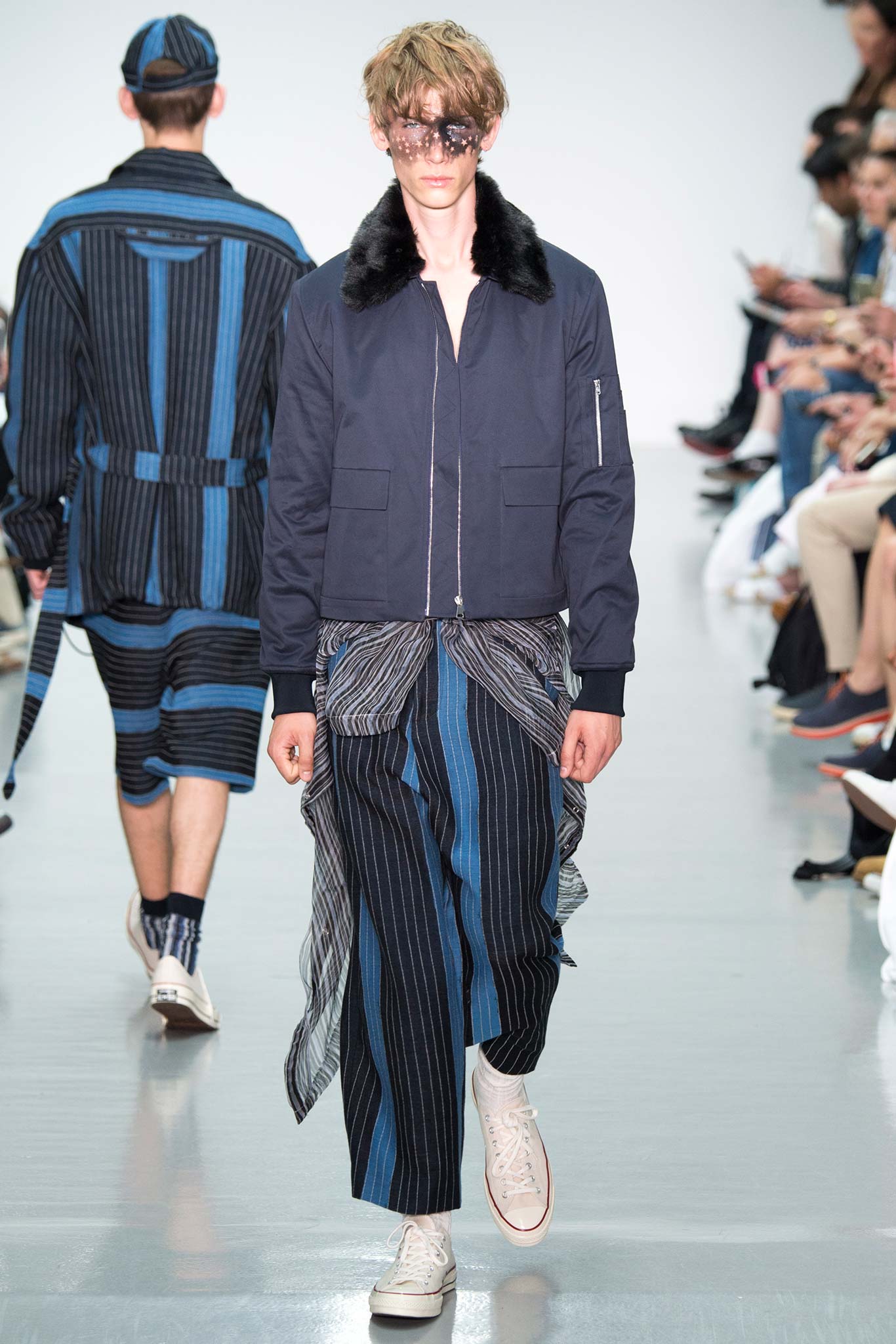 blue and black striped jacket and pants