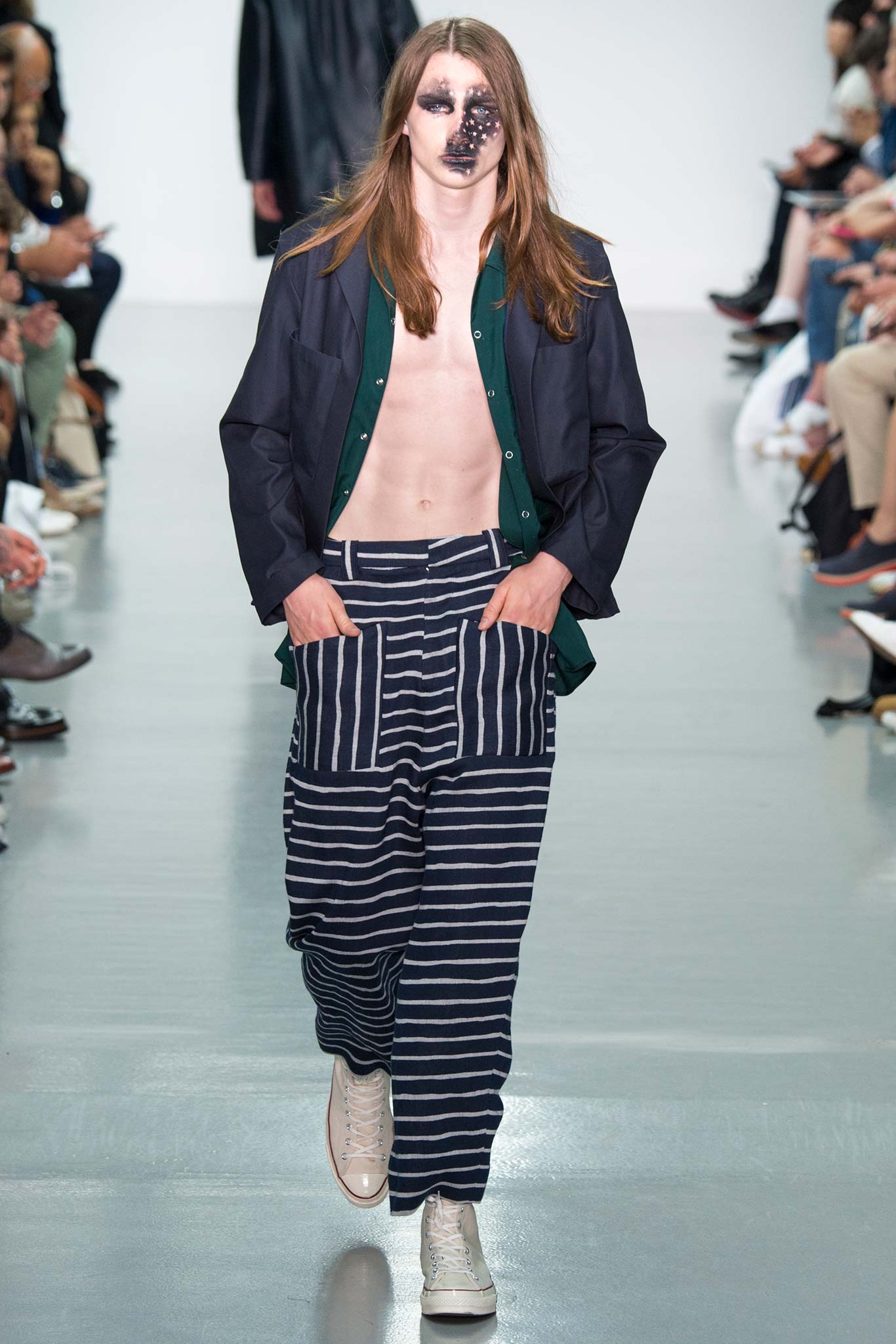 black relaxed shirt with striped pants