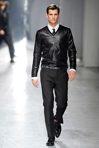 black leather shirt and tailored pants