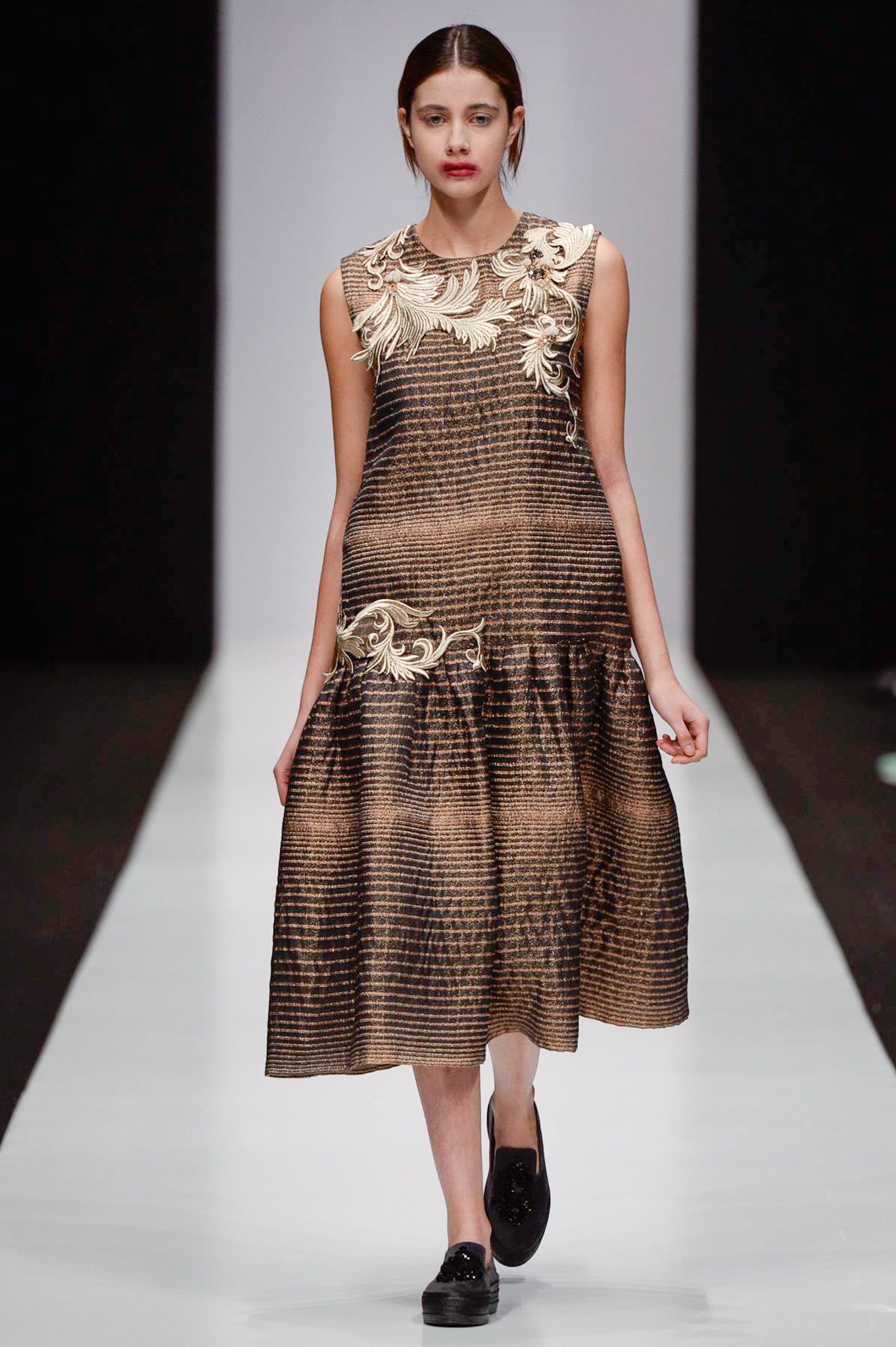 brown and gold pleated dress