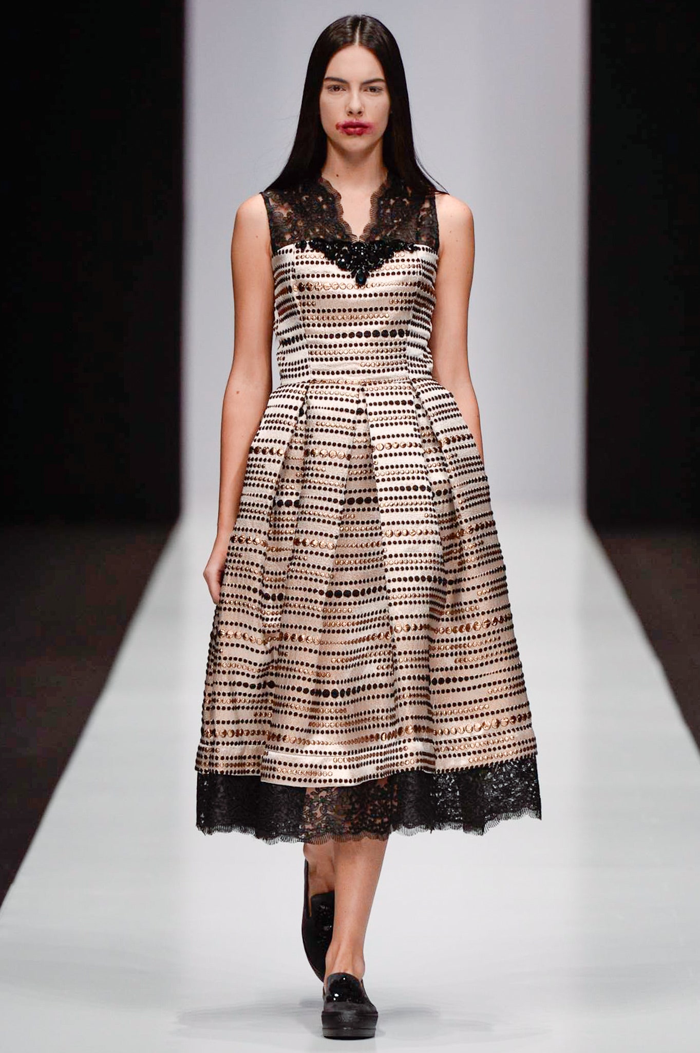 beige and black pleated dress