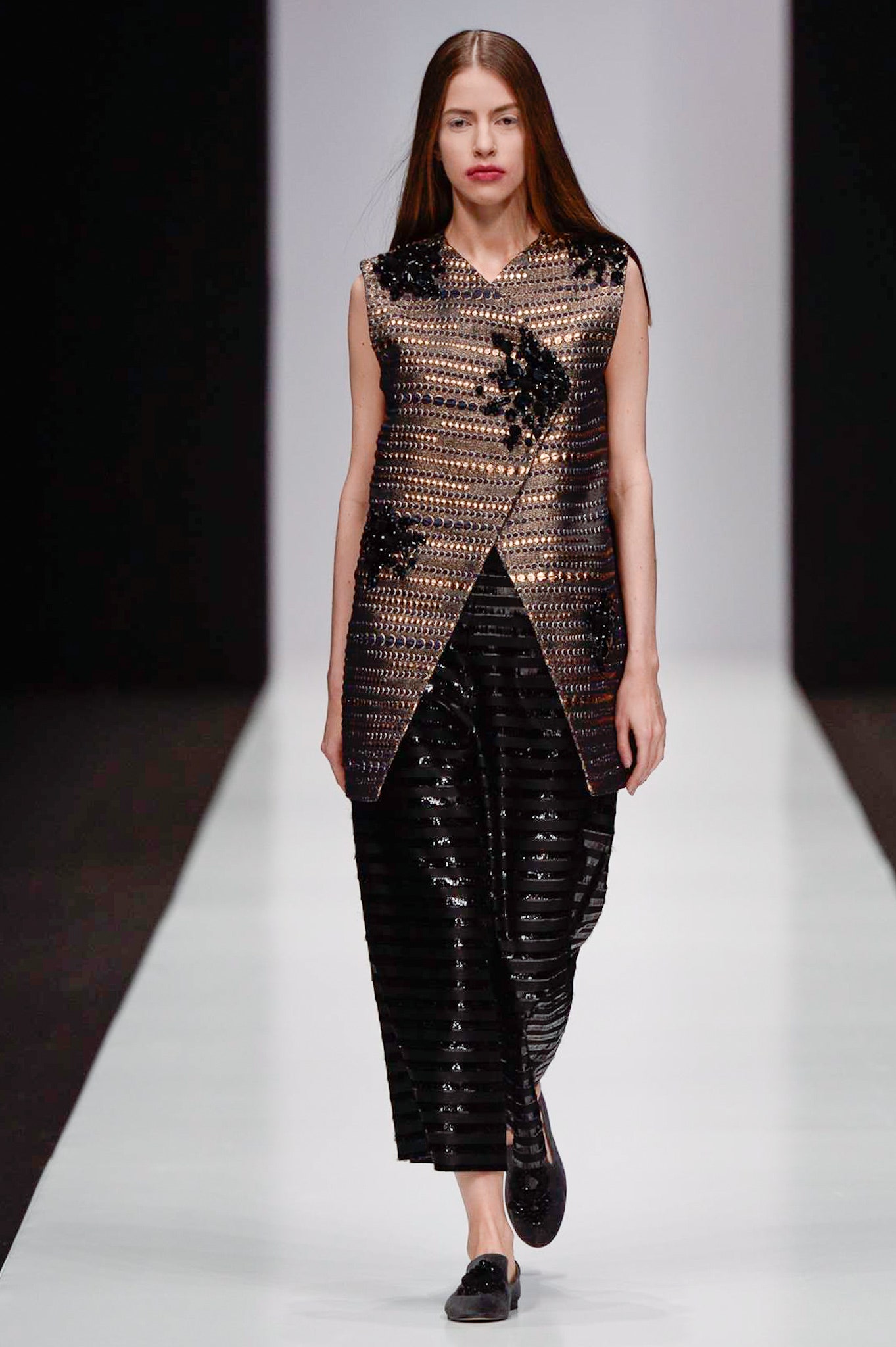 black and gold embellished top with relaxed pants