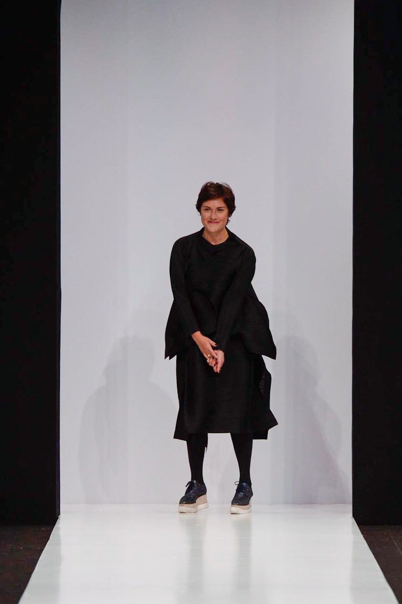 black midi dress with asymmetric design