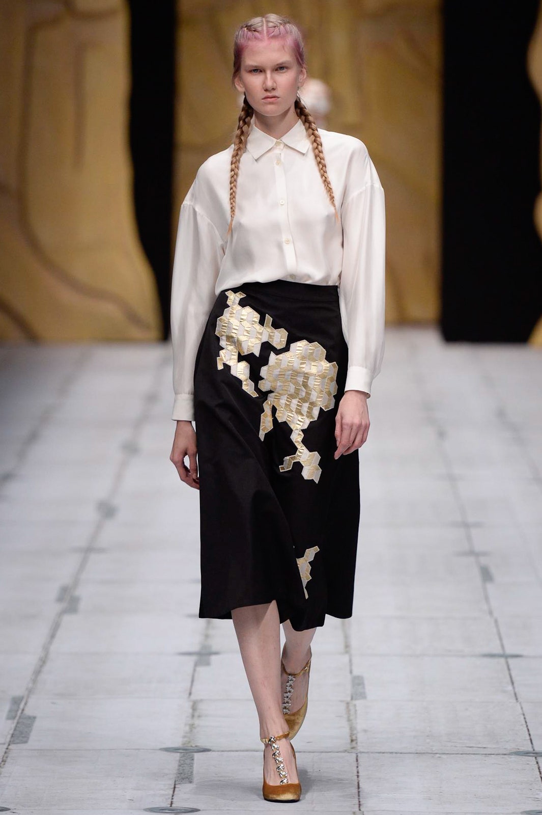 white relaxed shirt and black asymmetric skirt