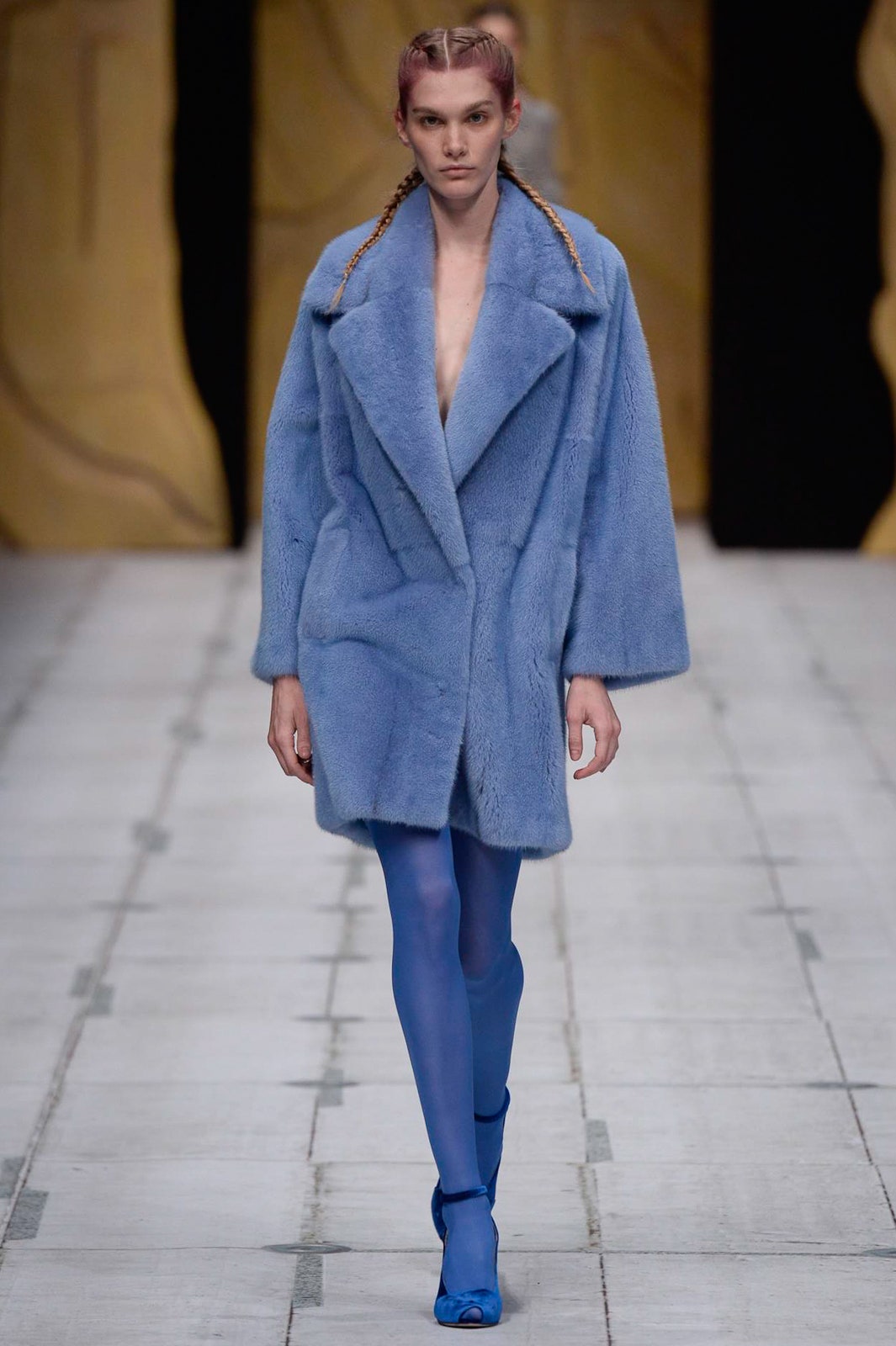 blue faux-fur coat with leggings