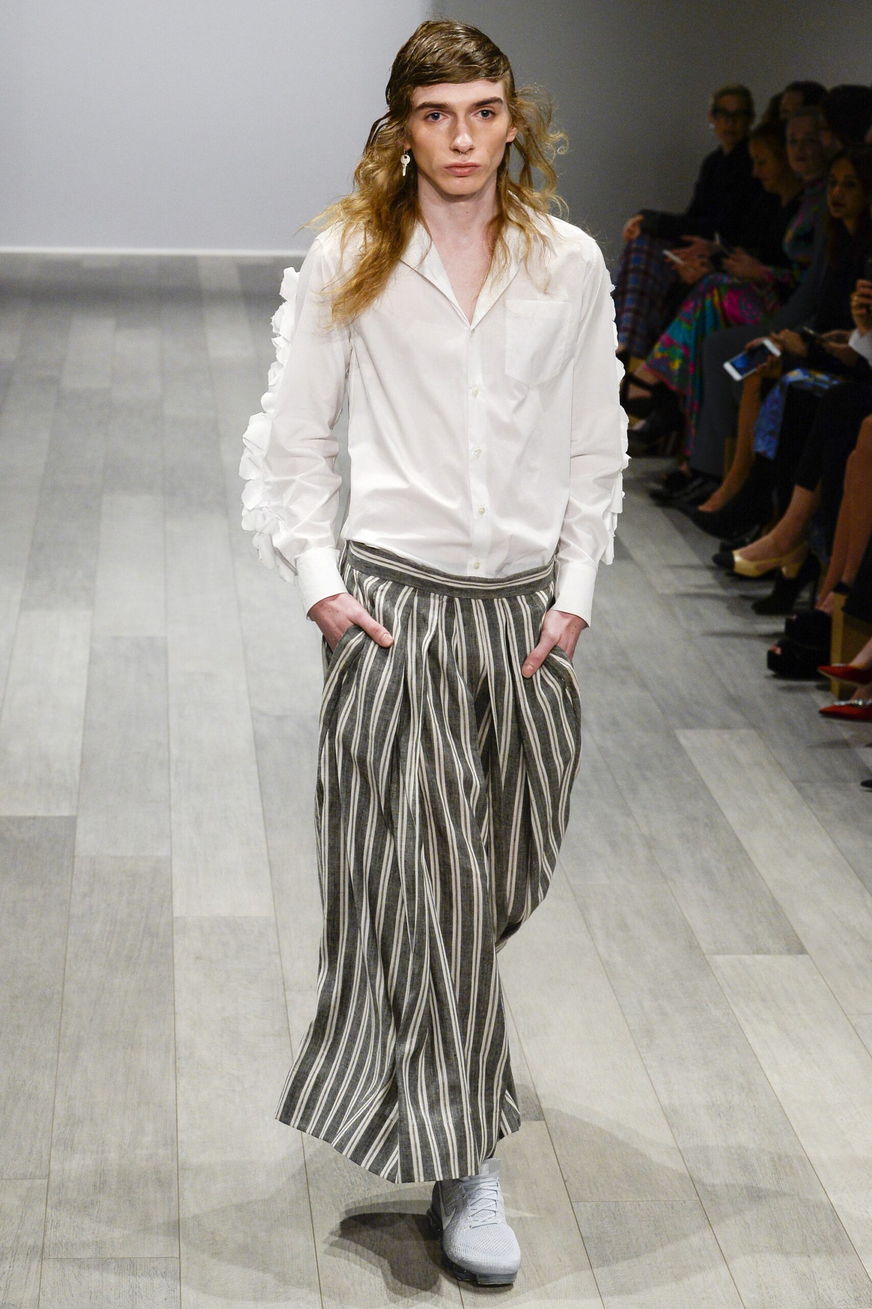 white fitted shirt and gray striped pants