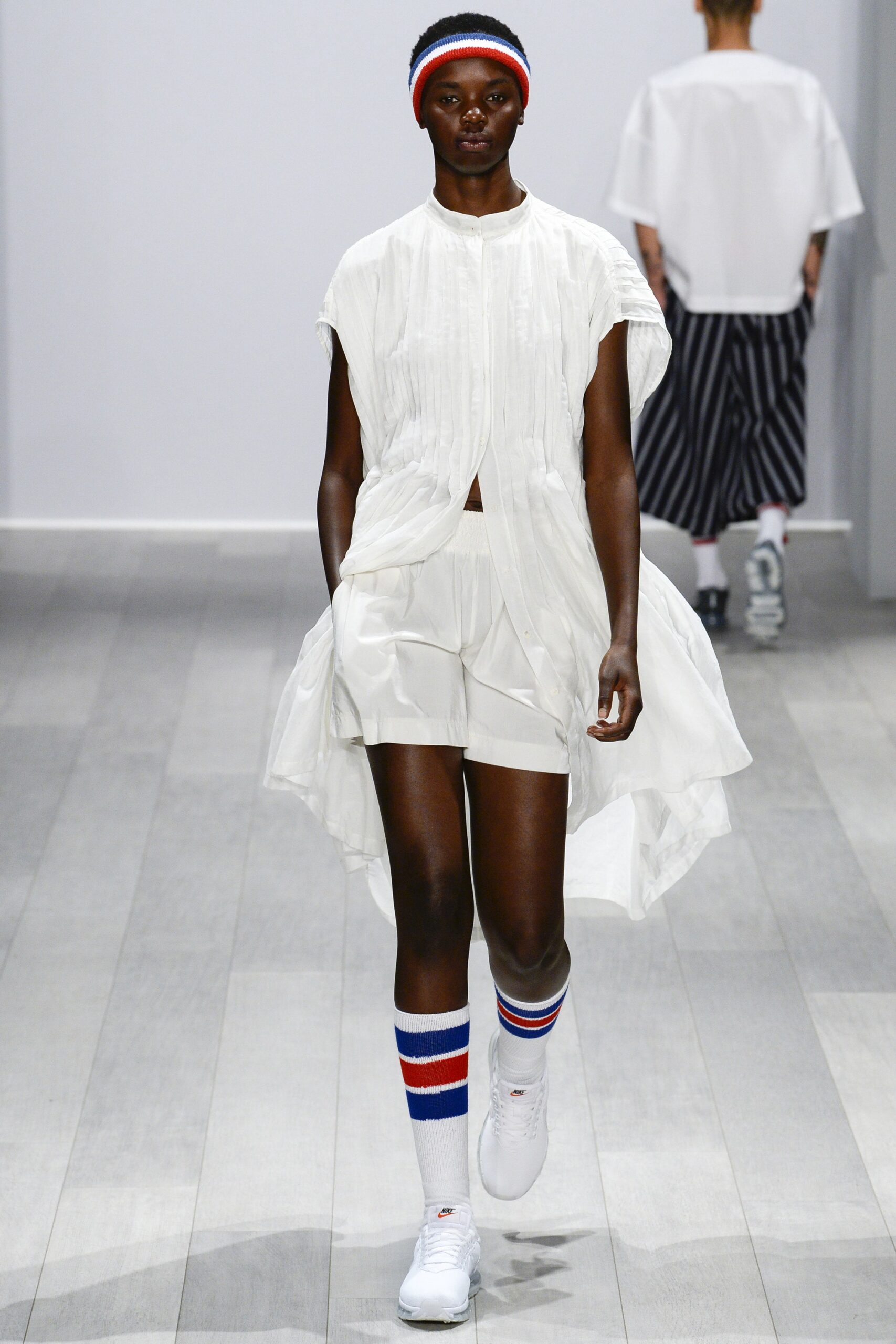 white relaxed top with shorts