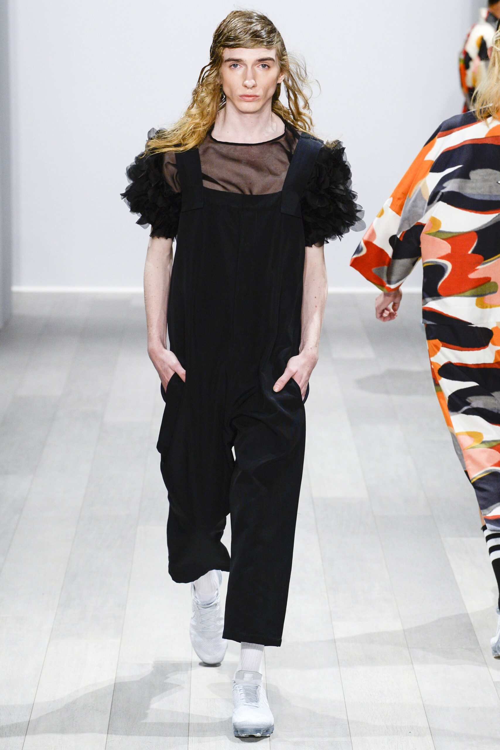 black relaxed jumpsuit with ruffled top