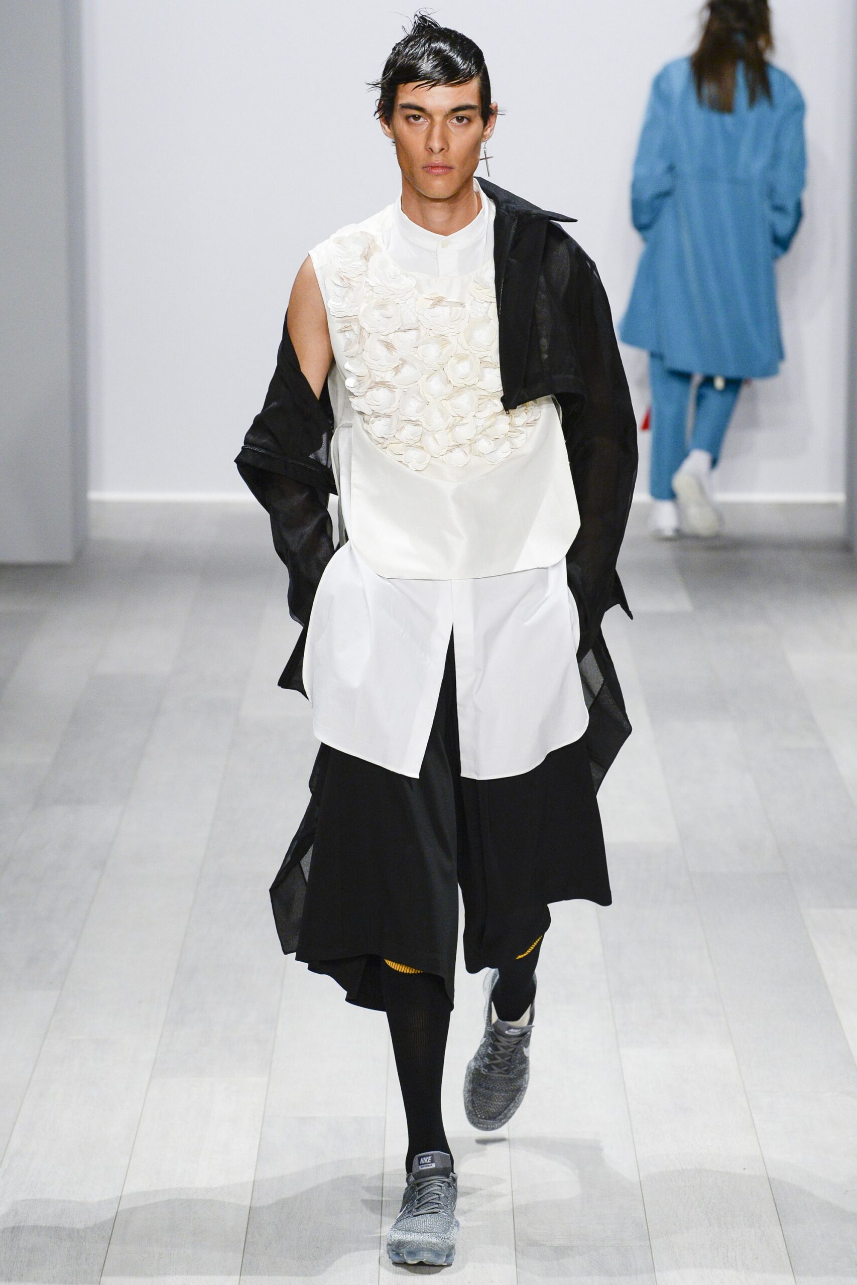 white embellished top with black jacket
