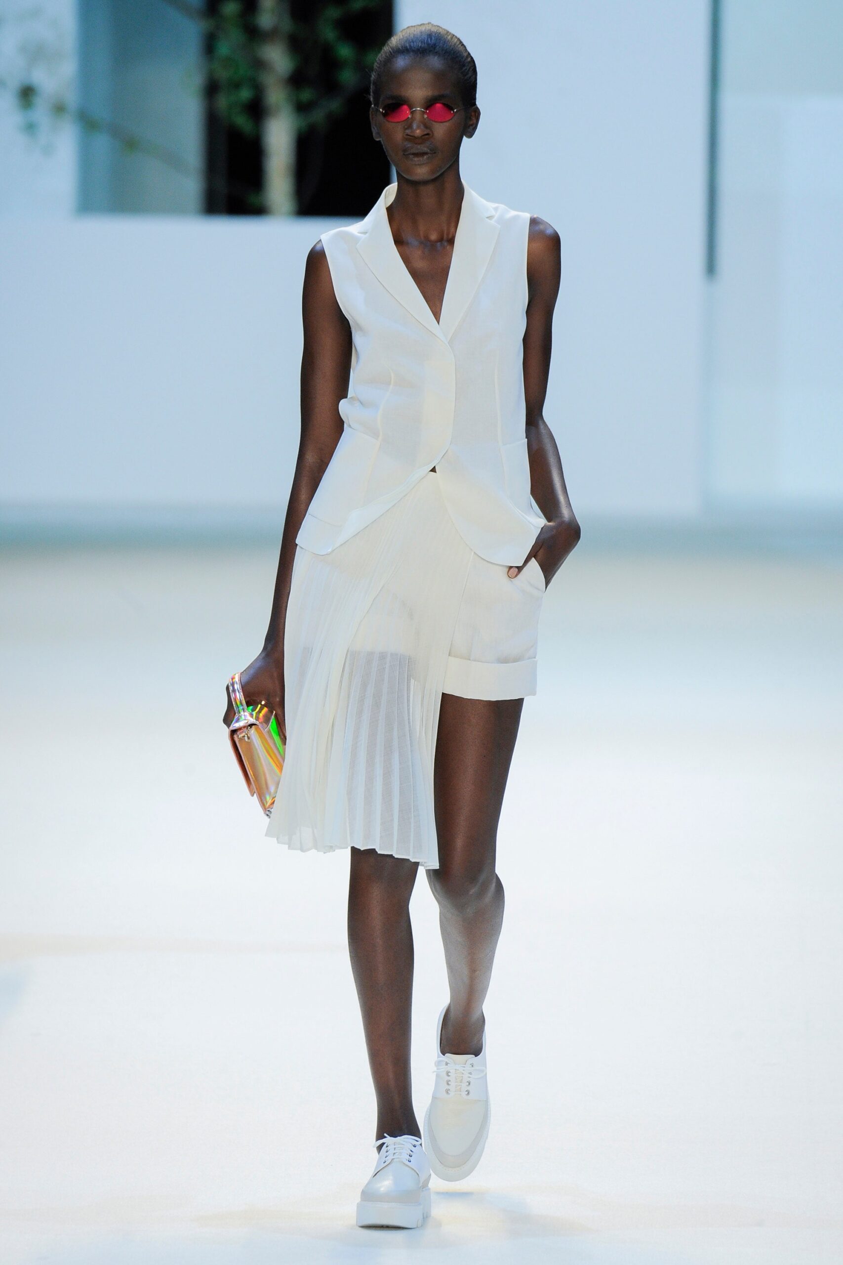 white fitted blazer and shorts