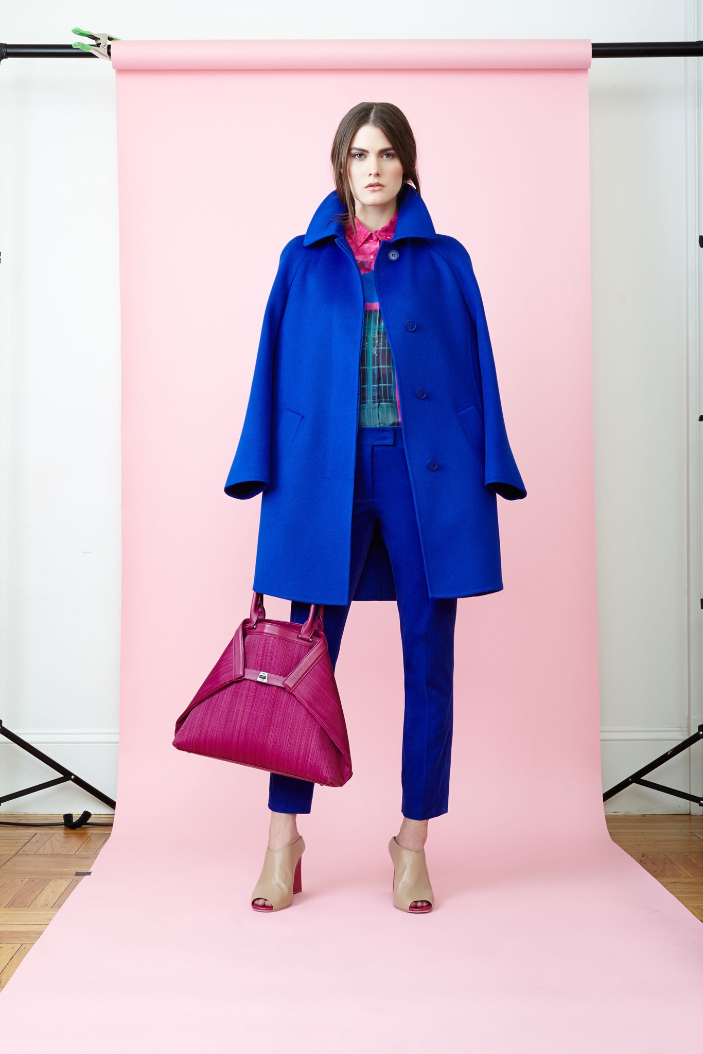 blue coat pink top blue pants
