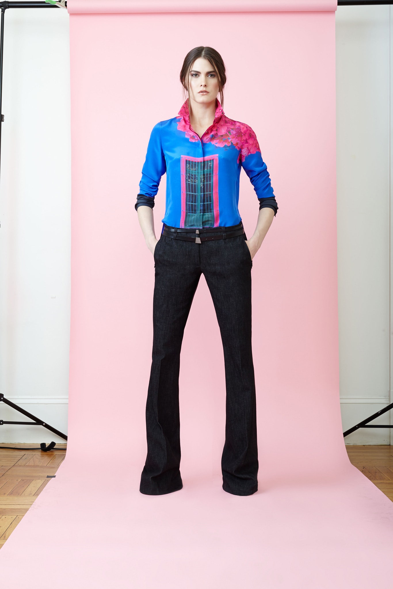 blue printed shirt with black flared pants