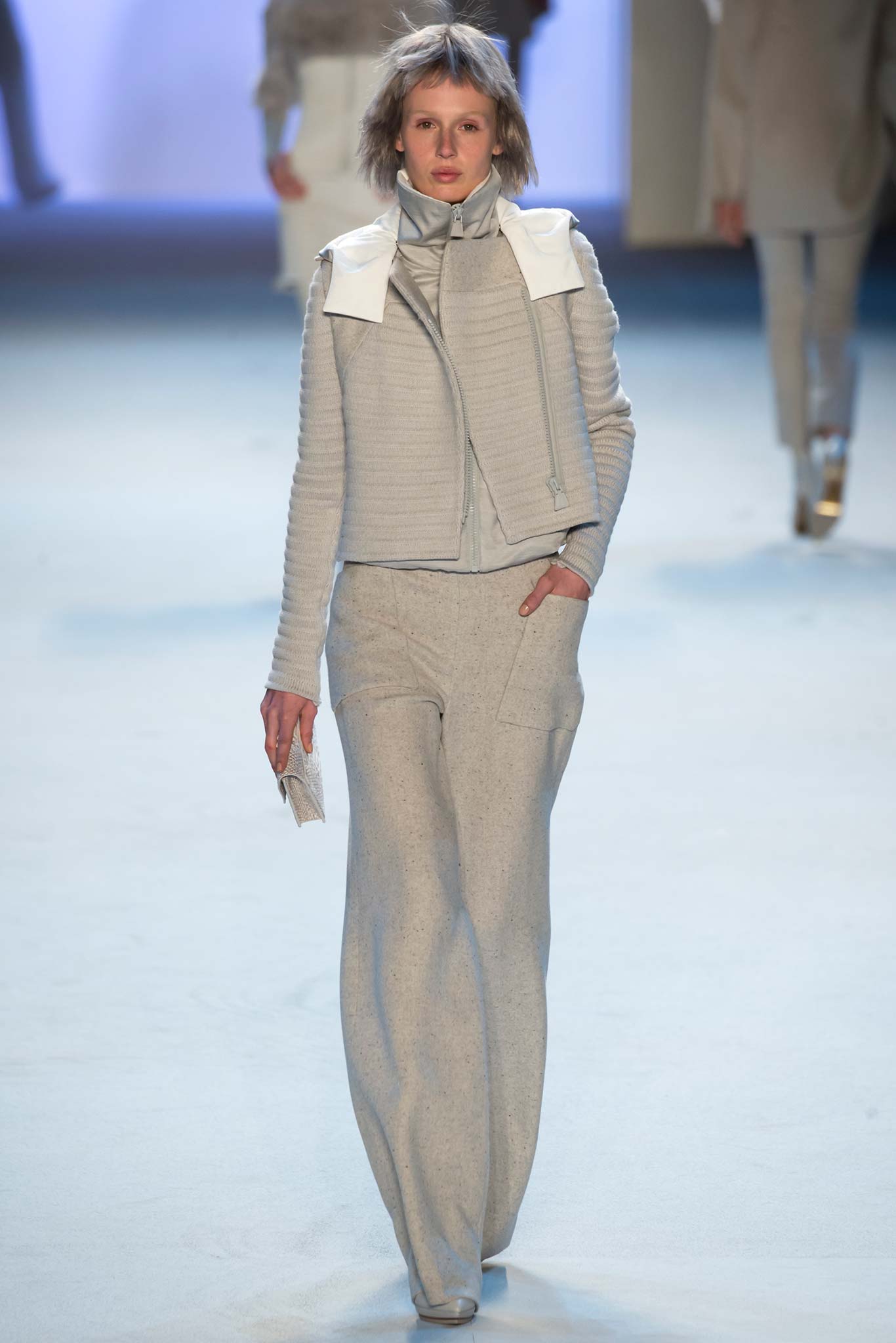 gray fitted jacket and relaxed pants