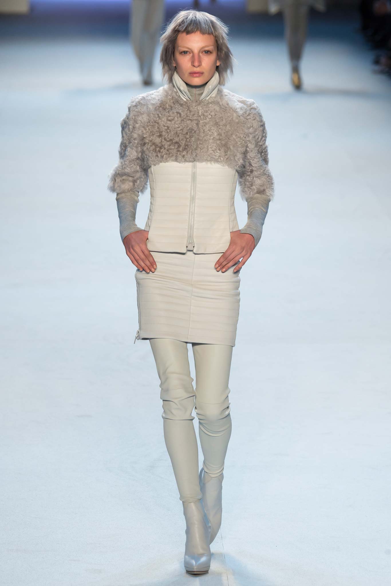 white leather fitted jacket and skirt