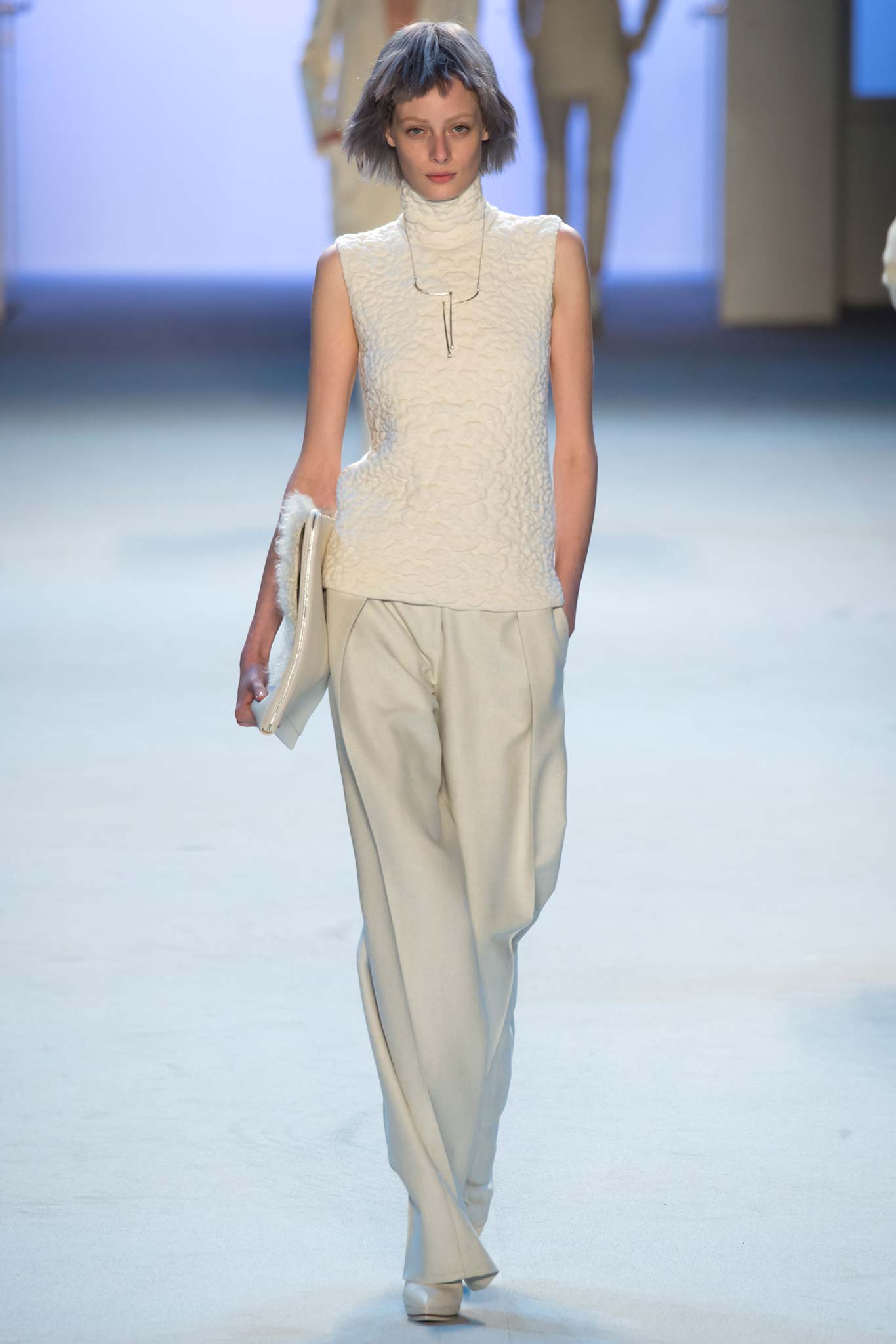 white fitted top with beige wide-leg pants