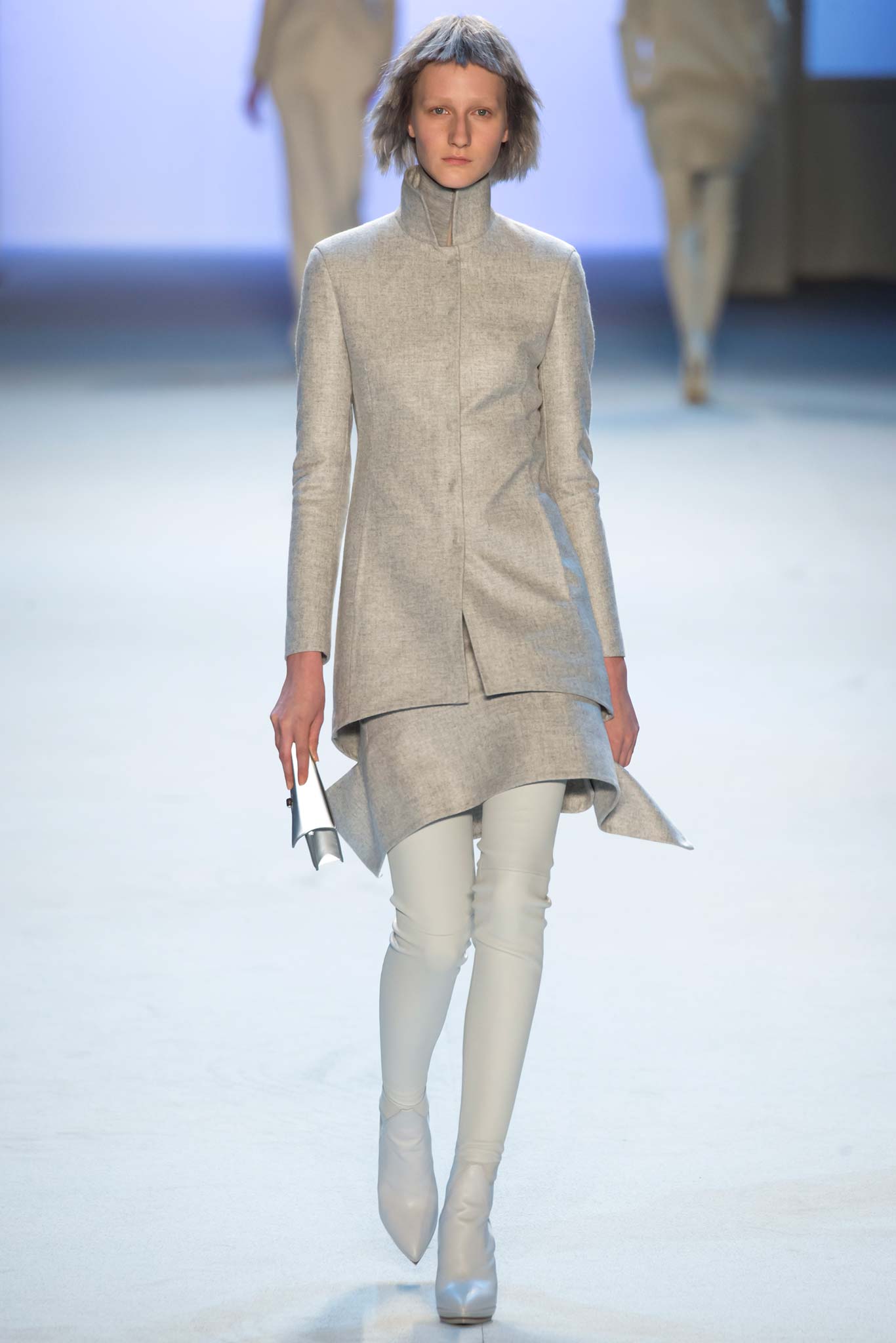 gray wool fitted coat with white pants