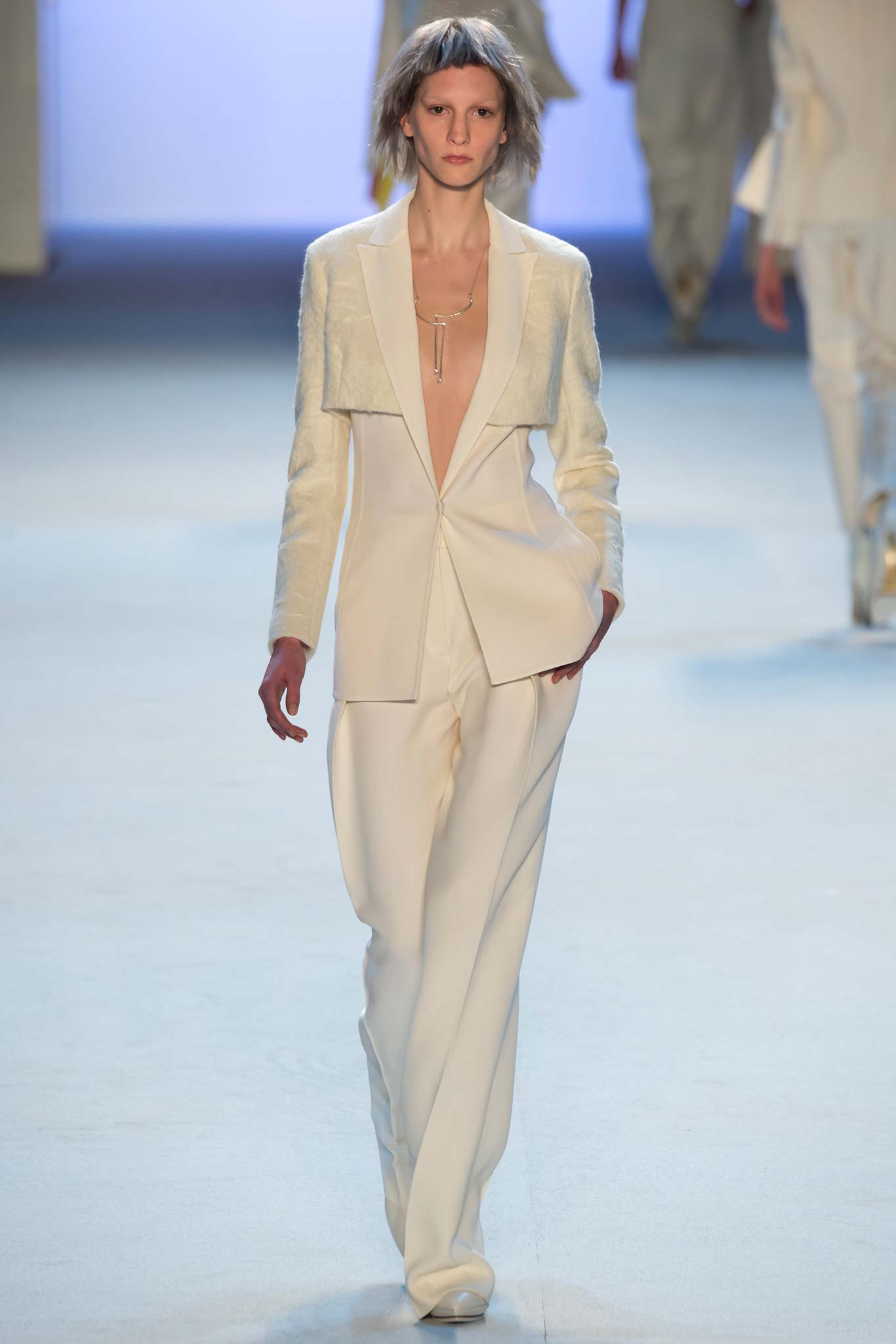 white tailored blazer and fitted pants