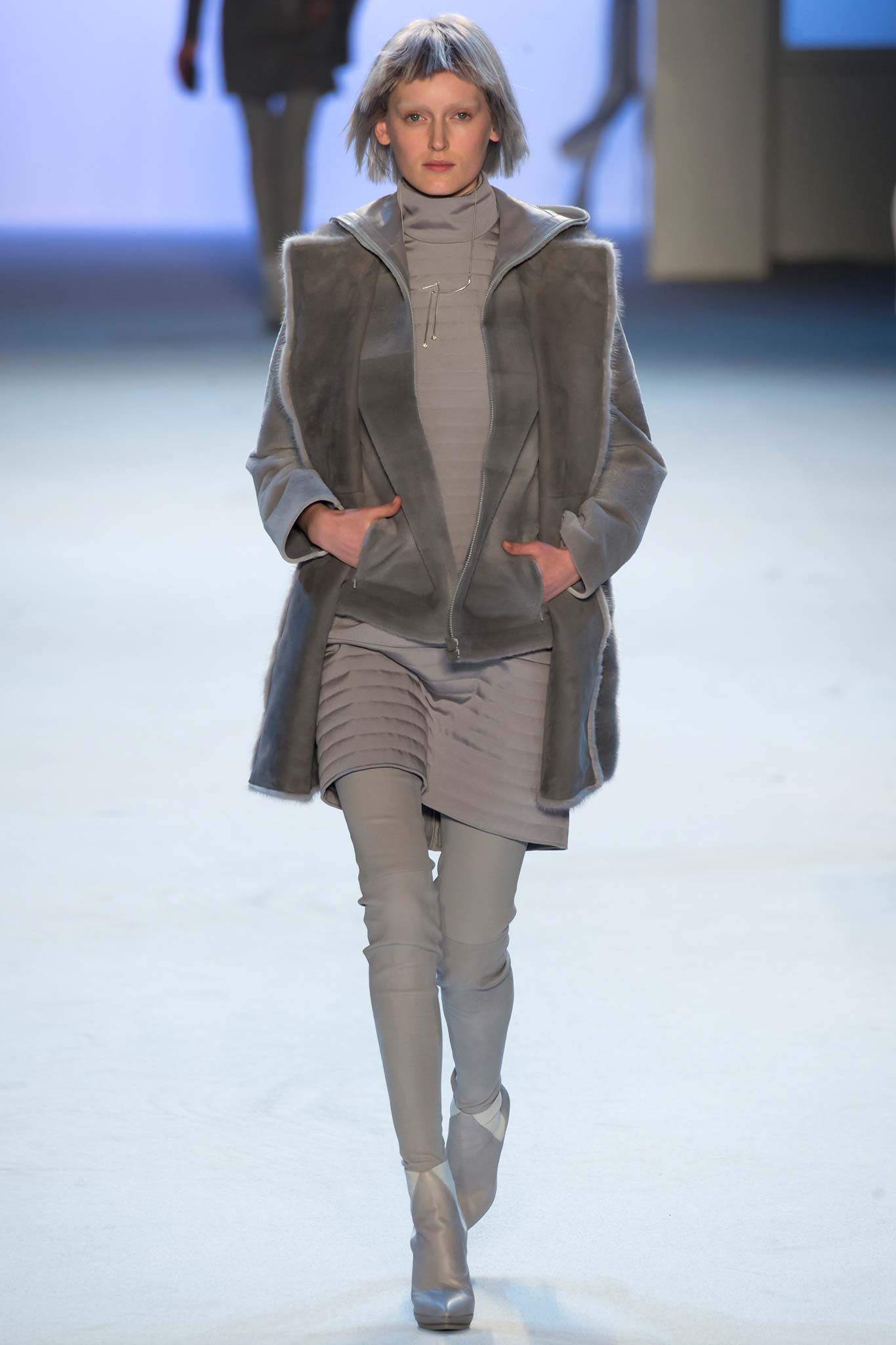 gray faux-fur coat and dress