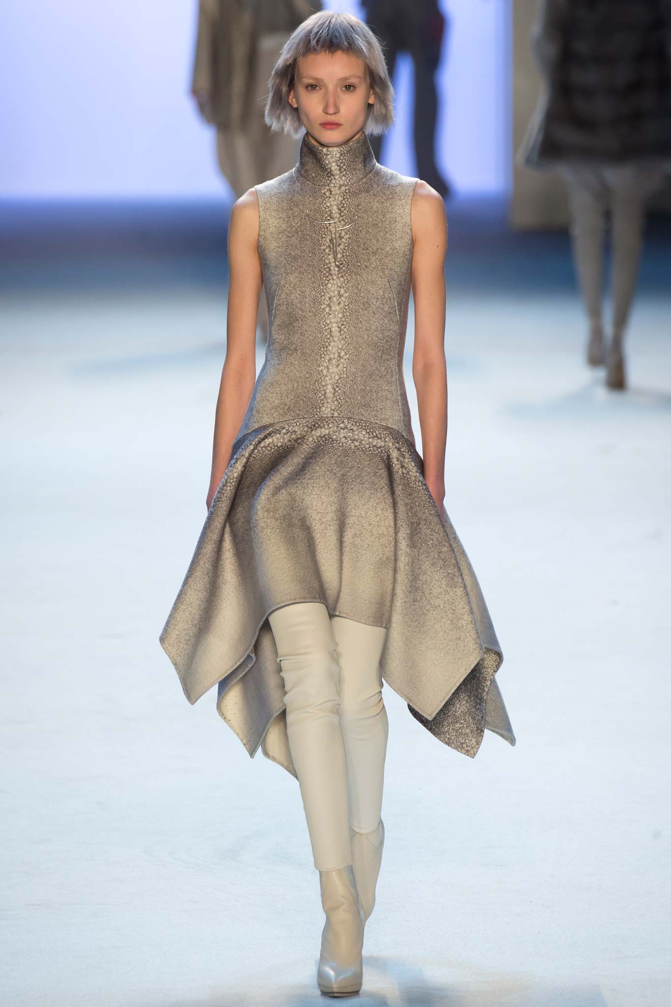 gray asymmetric silk dress with white leather pants