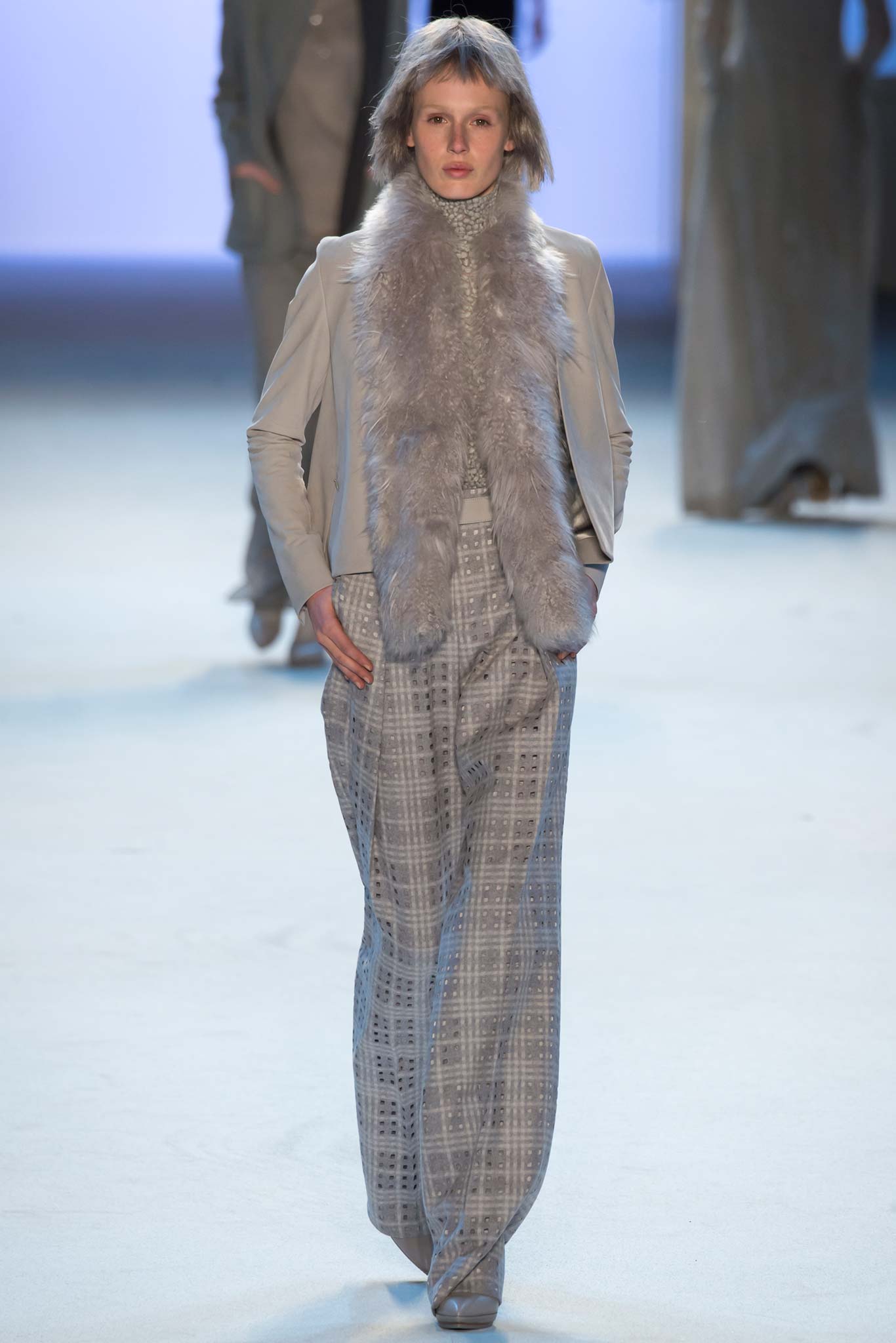 gray fitted jacket with wide-leg pants