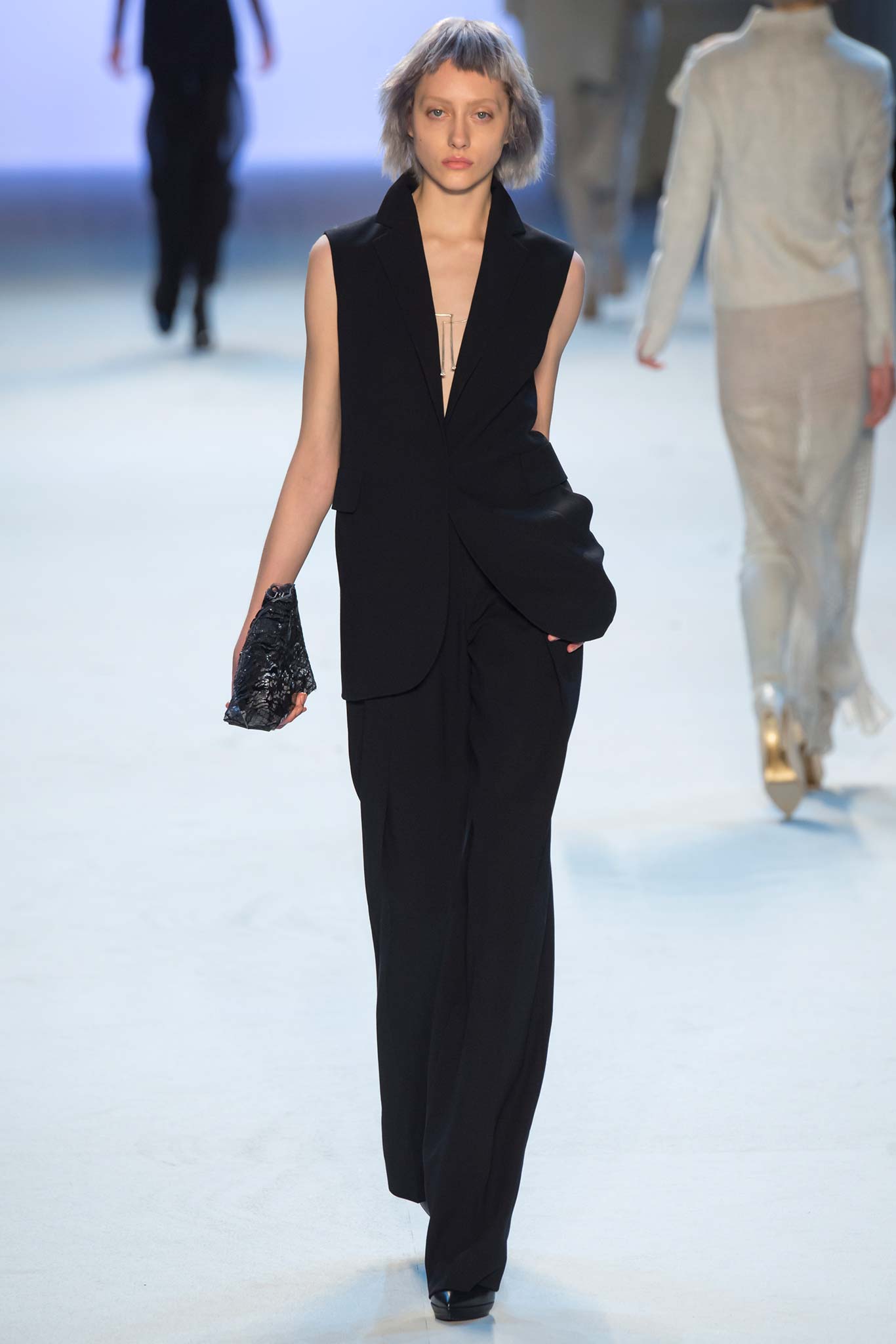 black tailored blazer and fitted pants