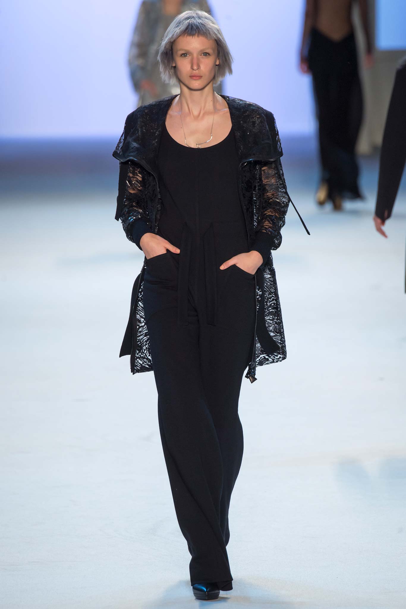 black fitted jumpsuit with lace coat