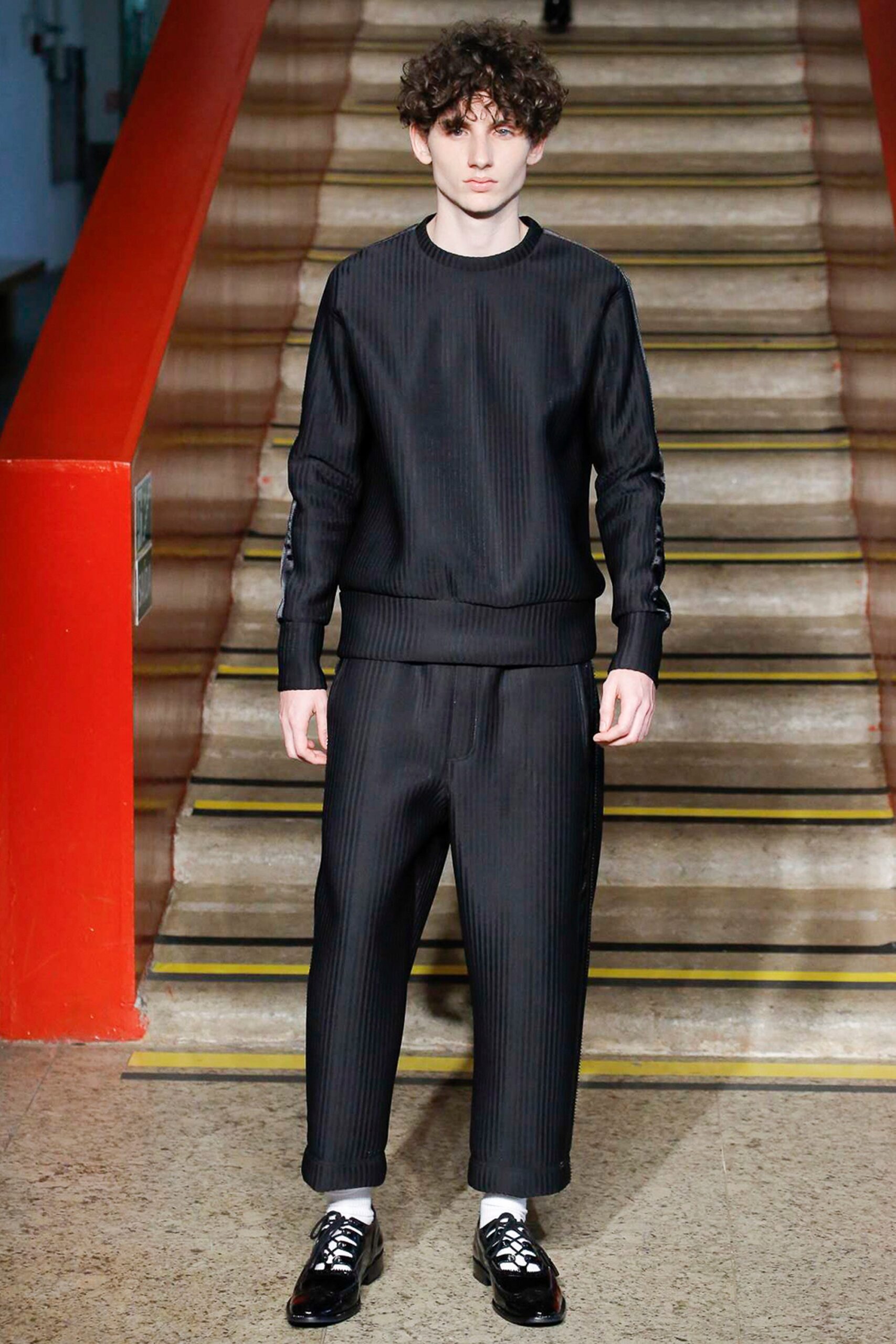 black relaxed sweater and pants