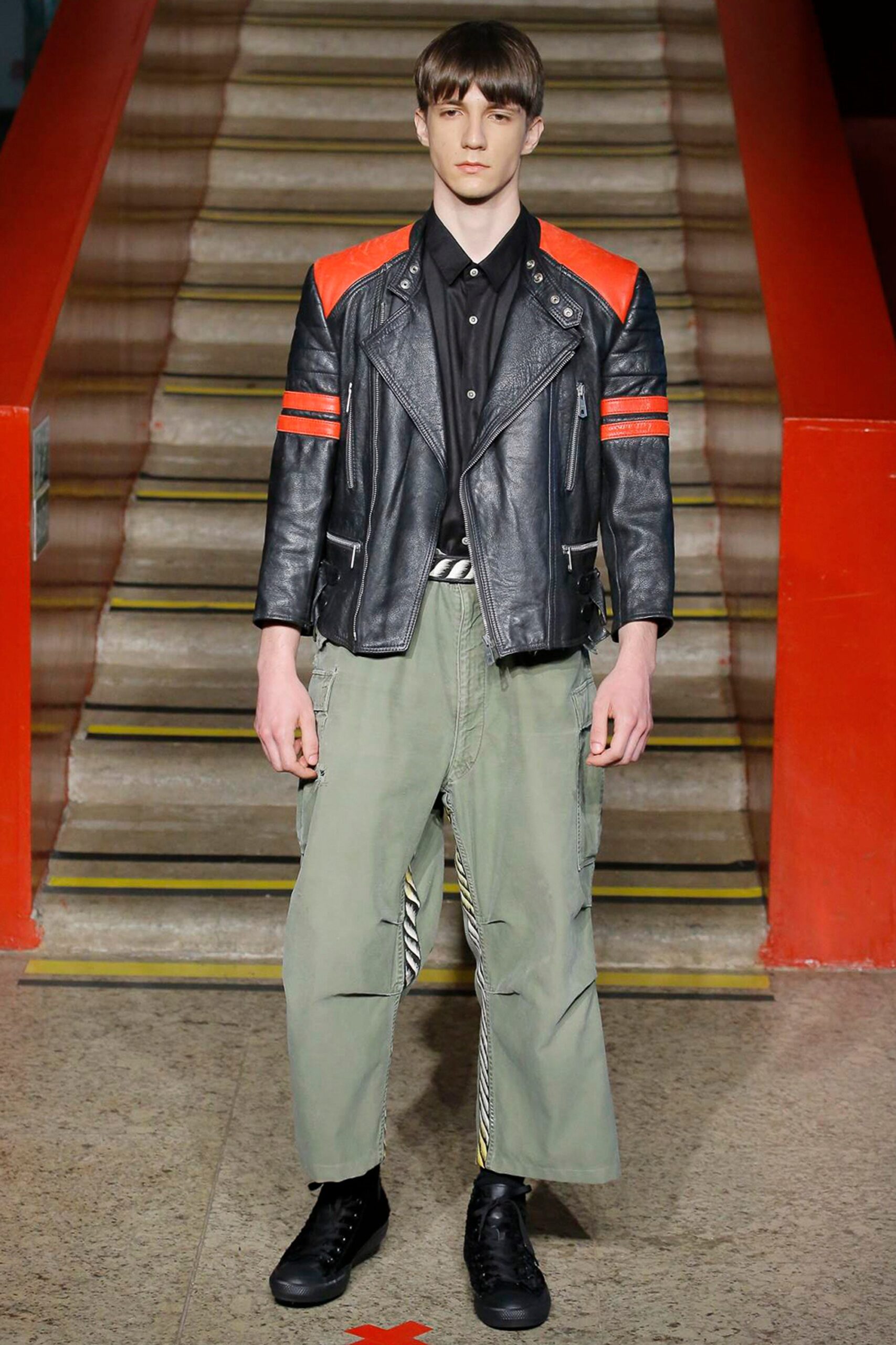 black leather jacket with red accents