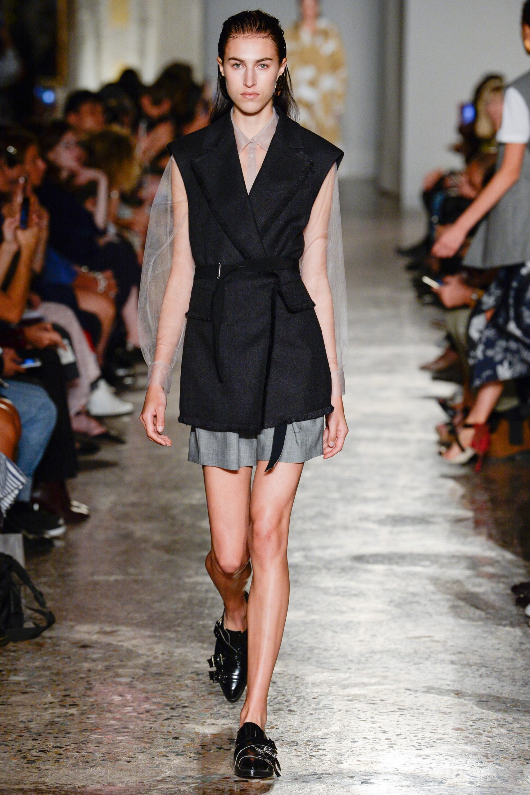 black blazer with pleated skirt
