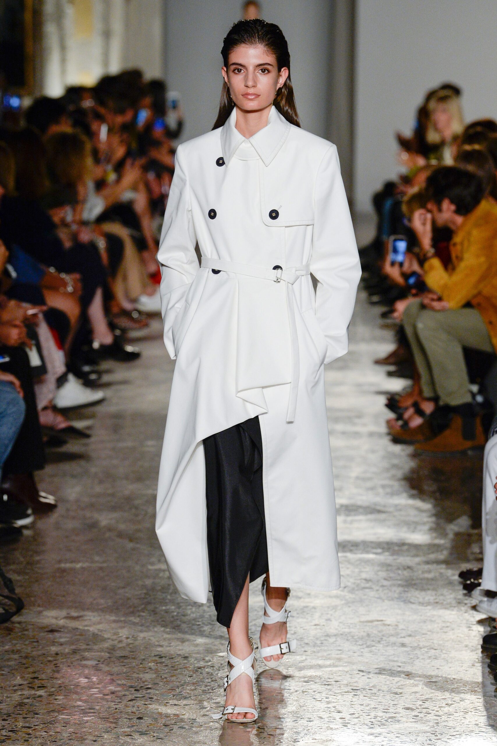 white belted coat with black pants
