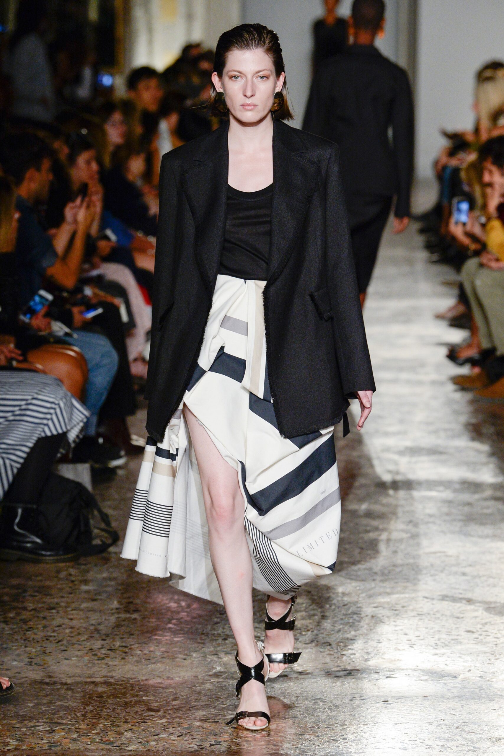black blazer with asymmetric skirt