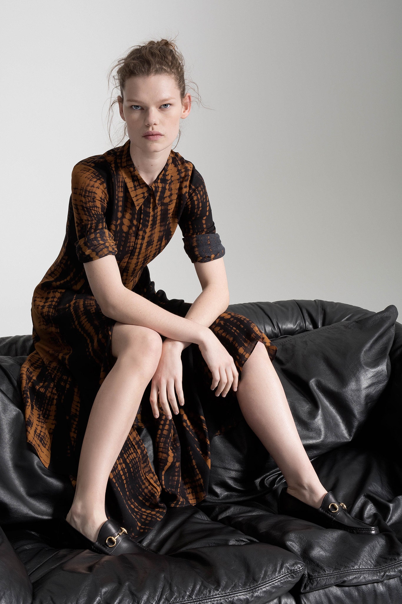 black and brown printed midi dress