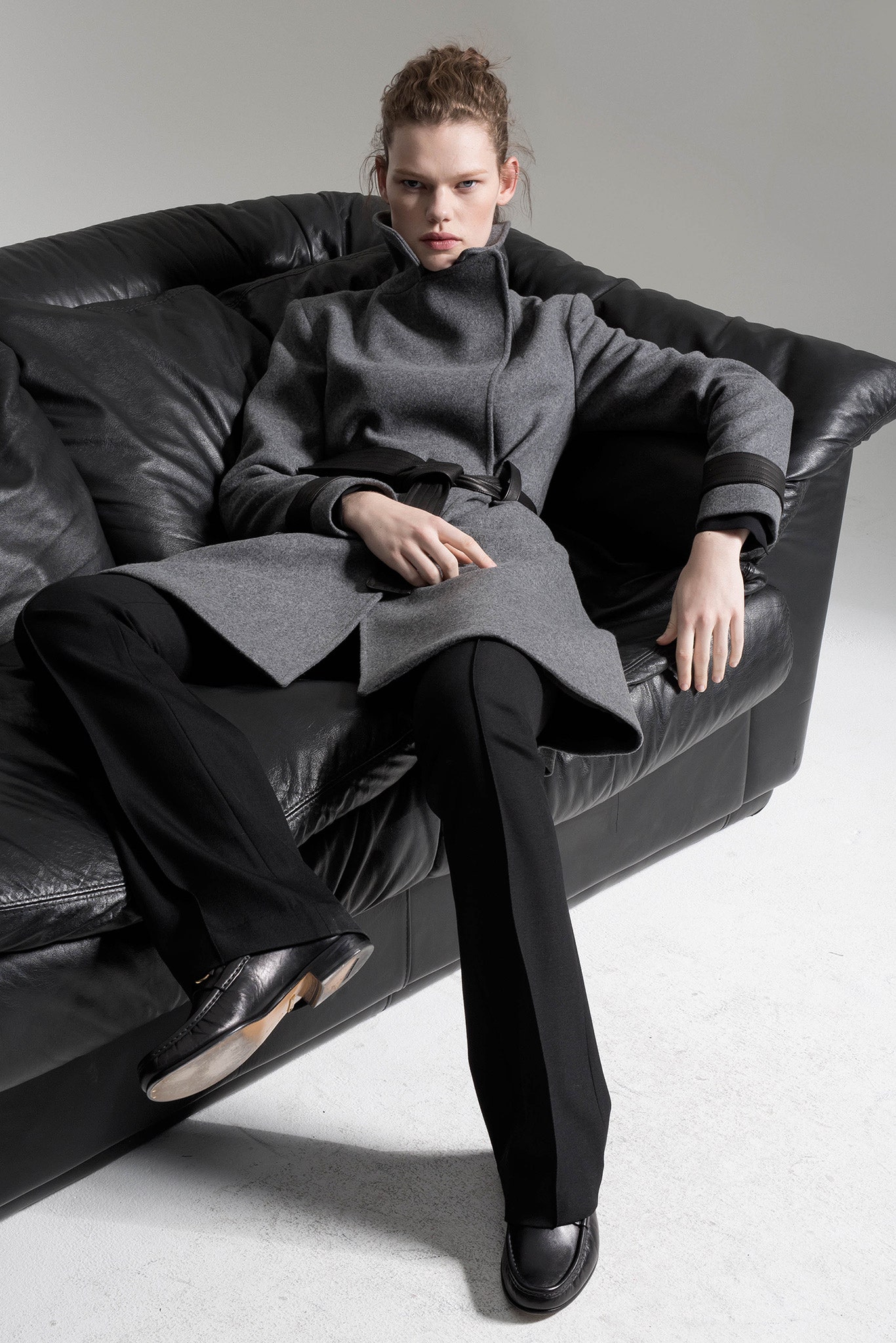 gray wool coat with black pants