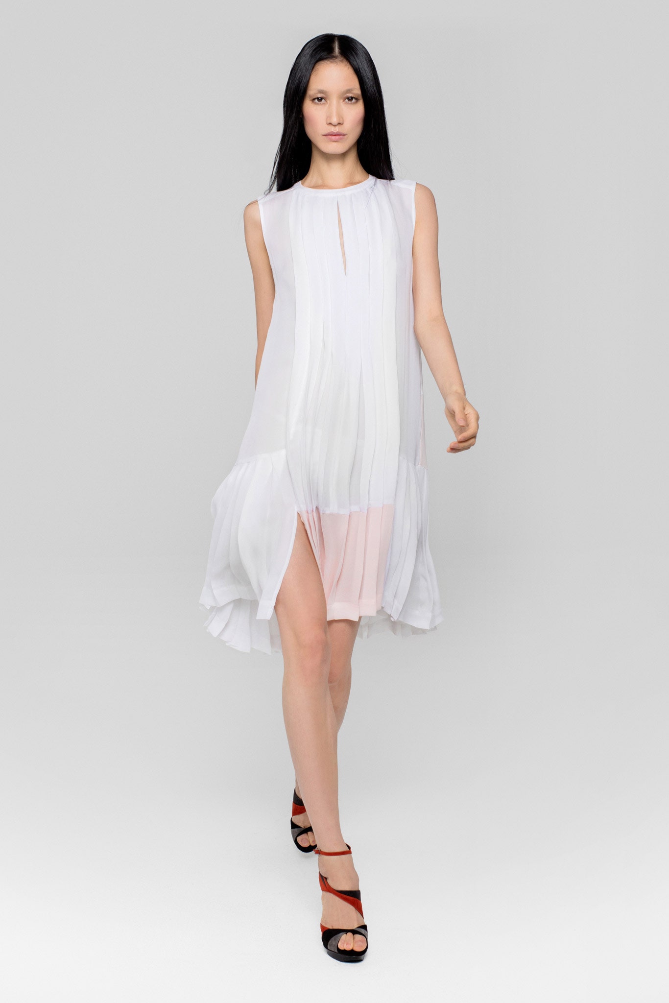 white pleated midi dress with black shoes
