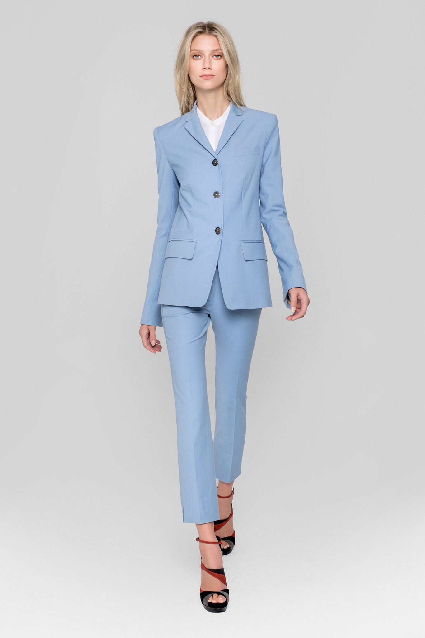blue tailored suit with heels