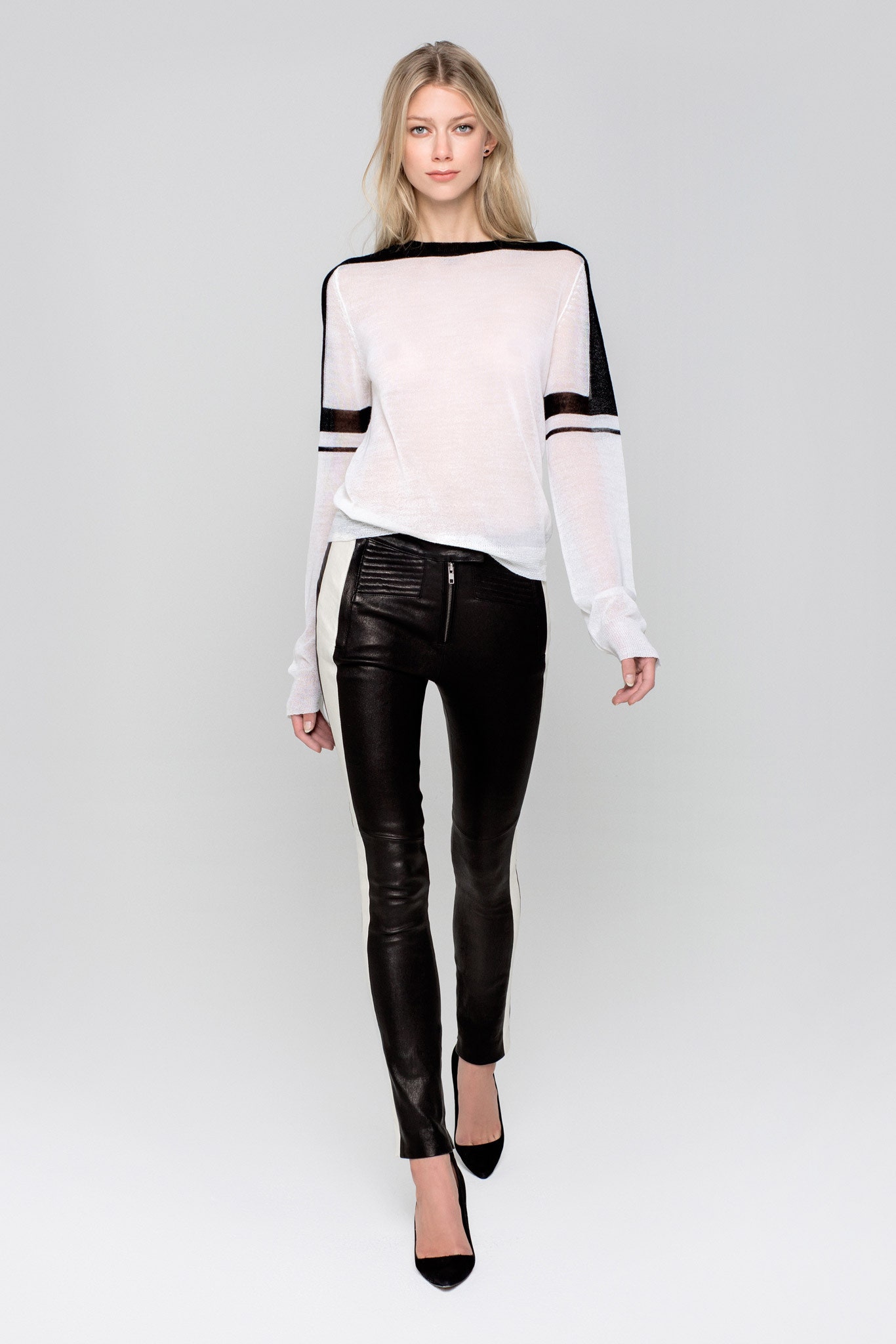 white fitted top with black pants