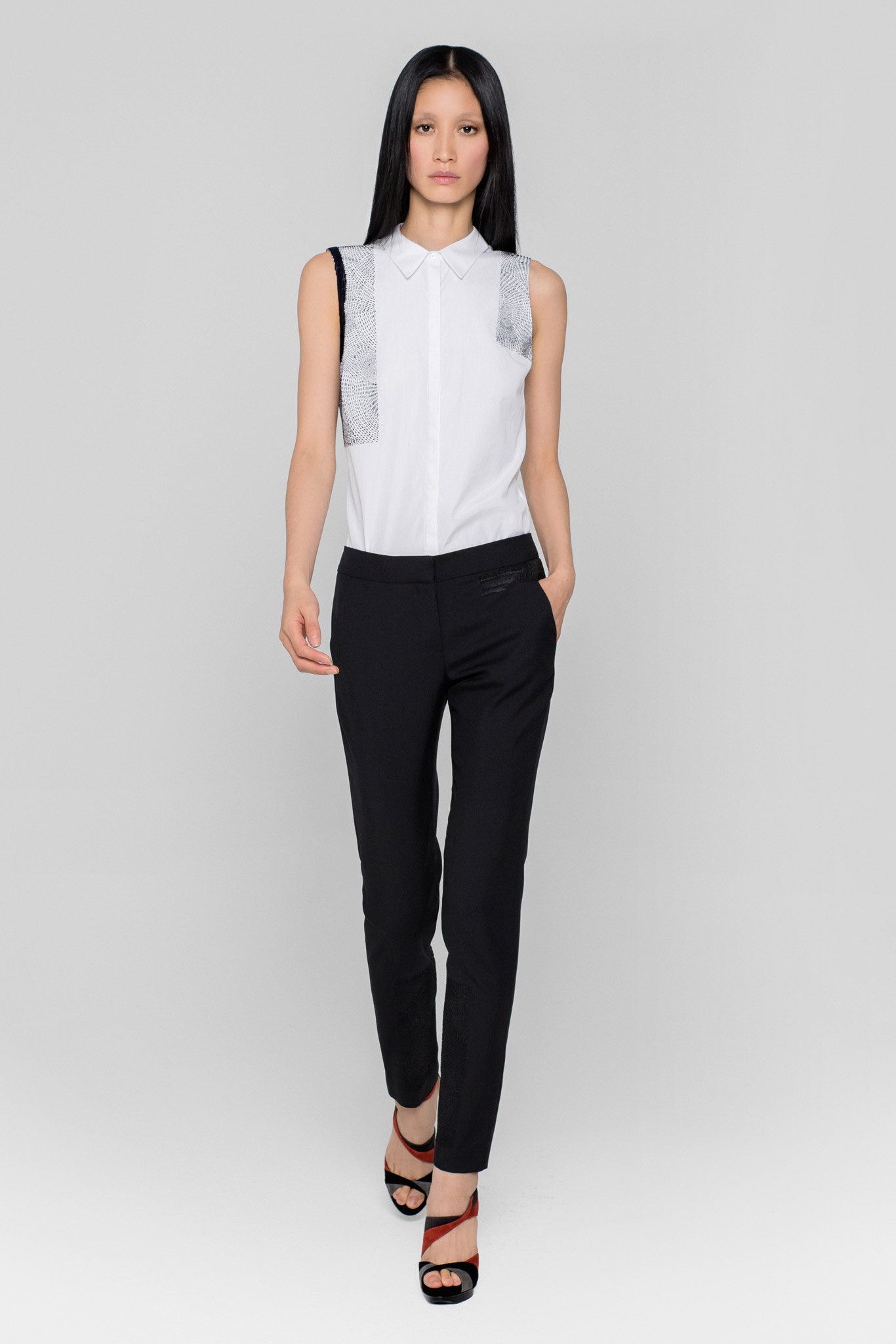 fitted white shirt and black pants