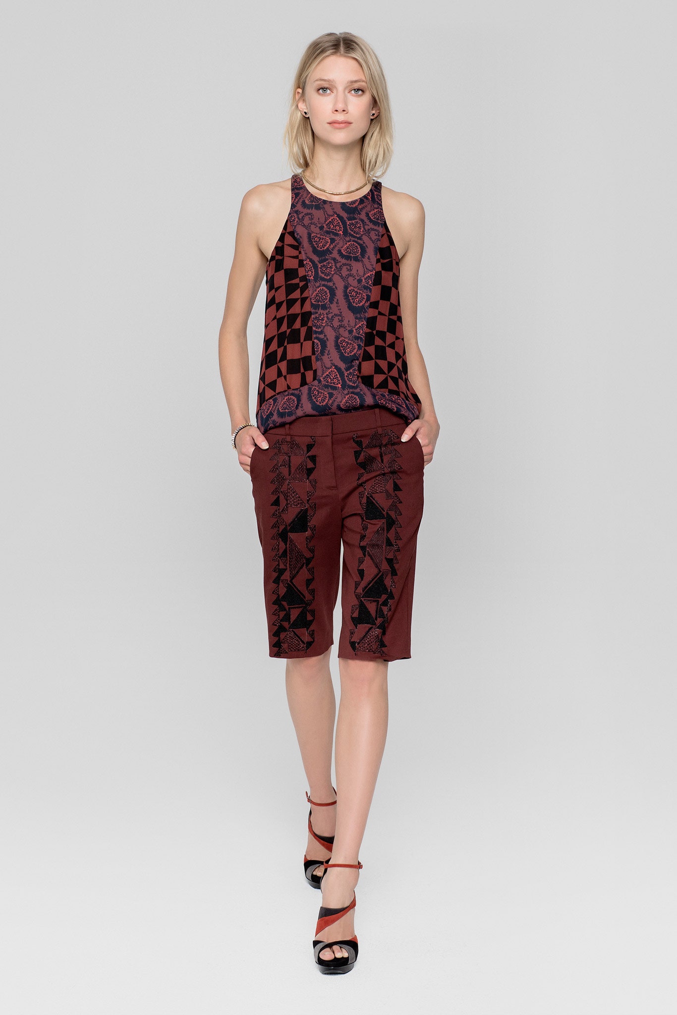 fitted red halter top with brown shorts