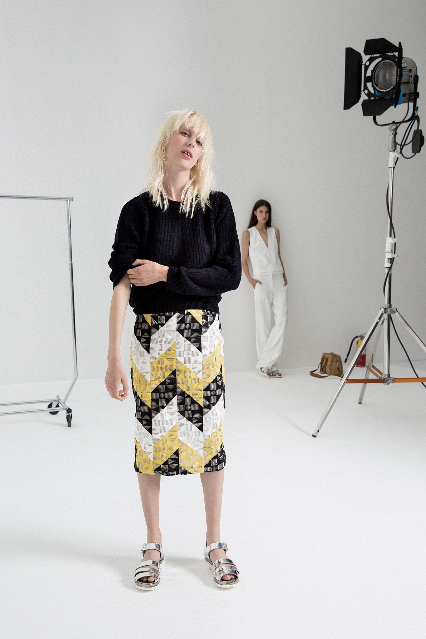 black wool relaxed sweater with zigzag skirt