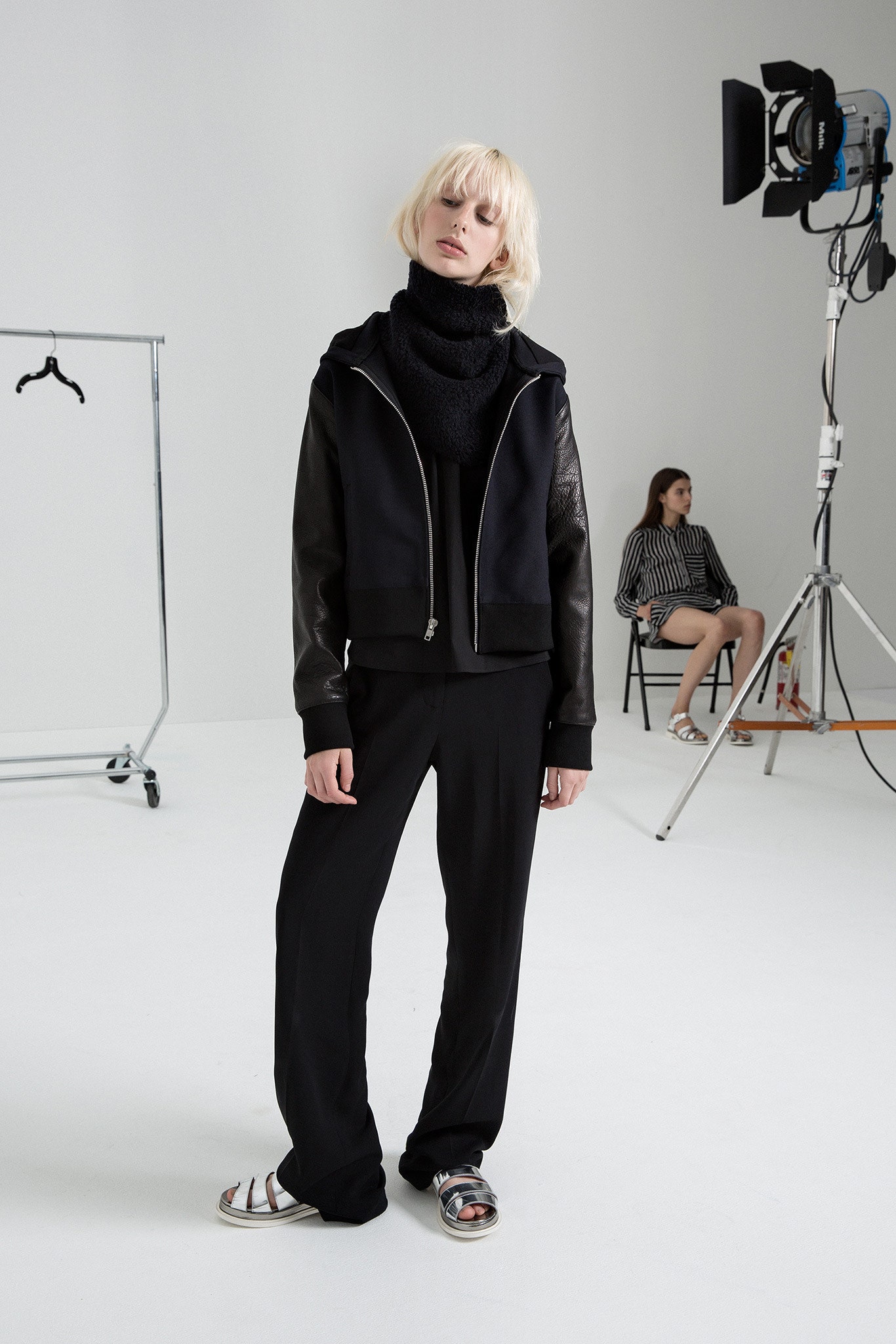 black fitted jacket with relaxed pants