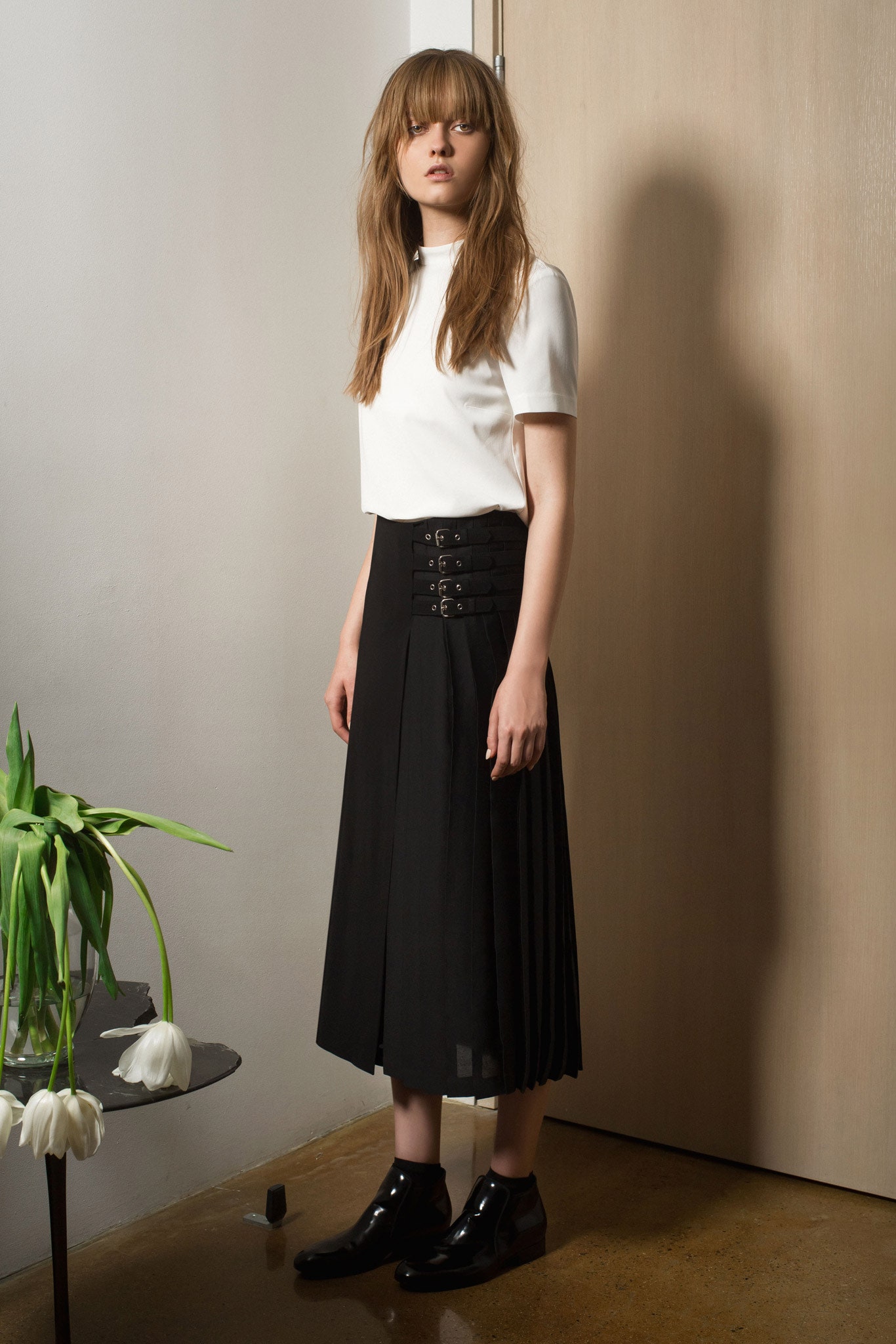 black cotton long-sleeve fitted pleated midi skirt