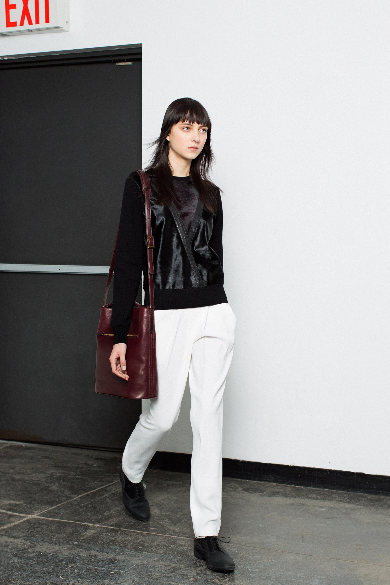 black velvet top with white pants