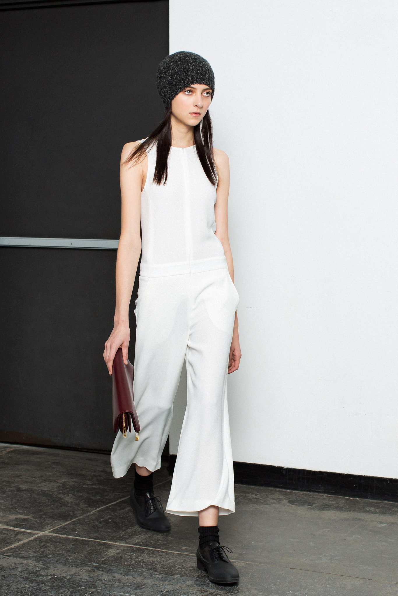 white fitted sleeveless jumpsuit