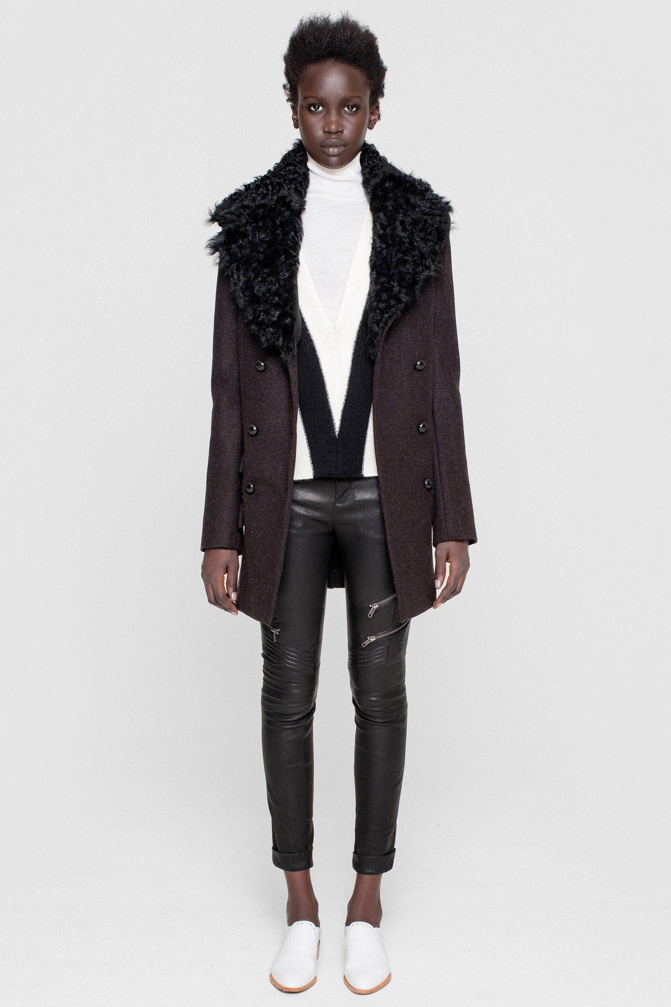 black wool long-sleeve collared structured layered coat