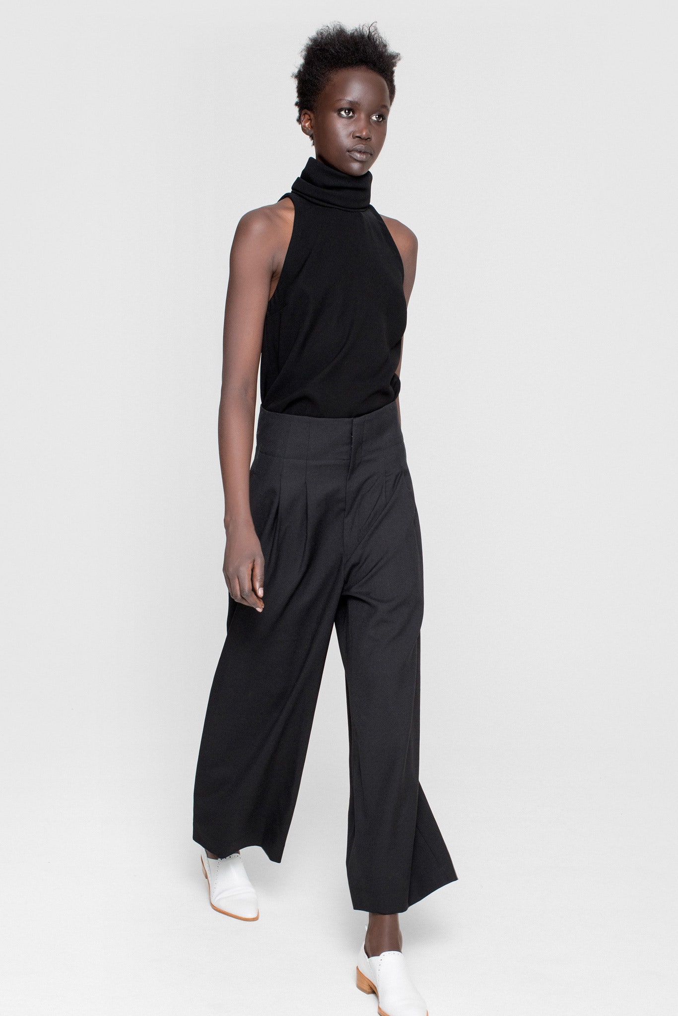 black fitted top with relaxed pants