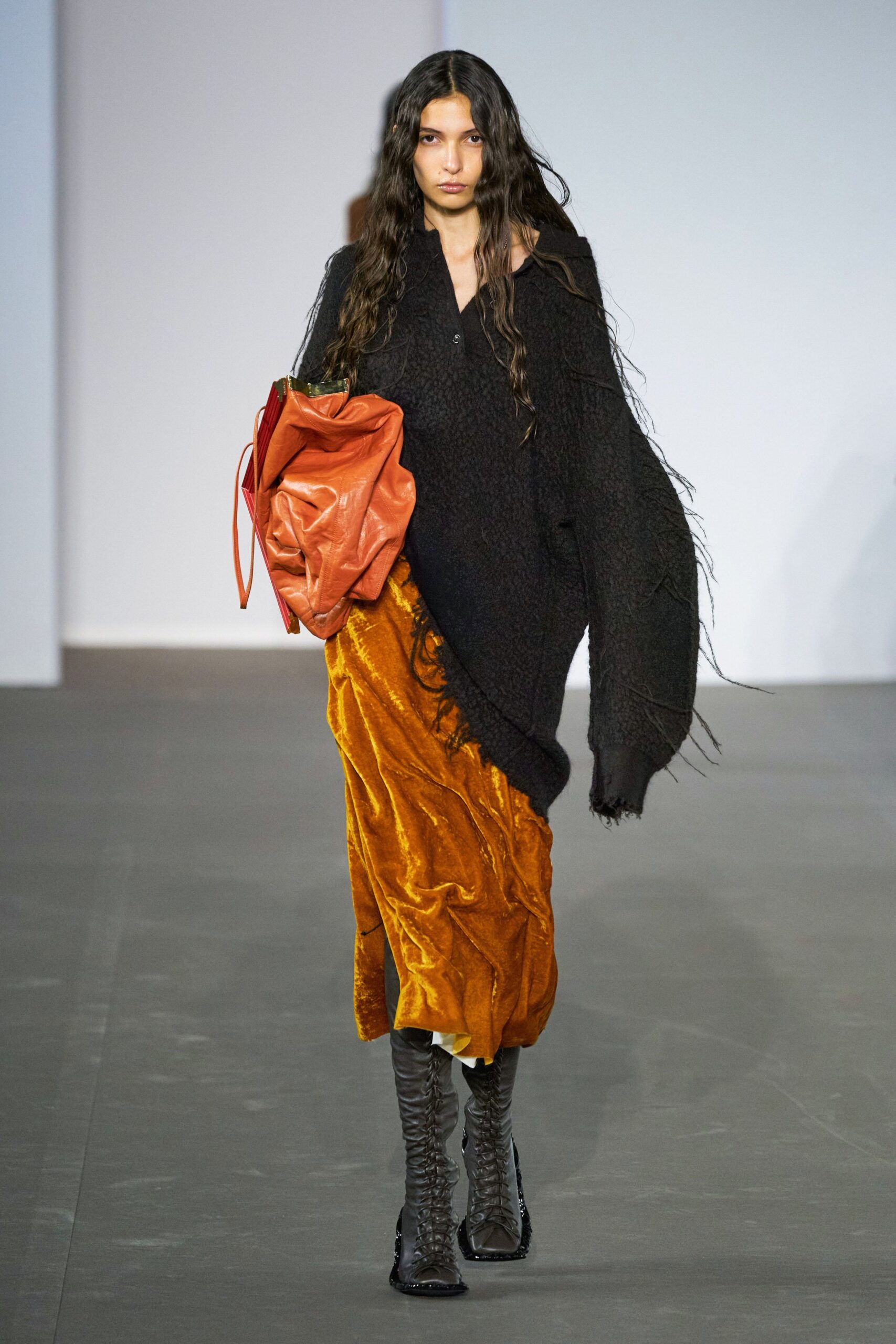 black oversized sweater orange velvet skirt