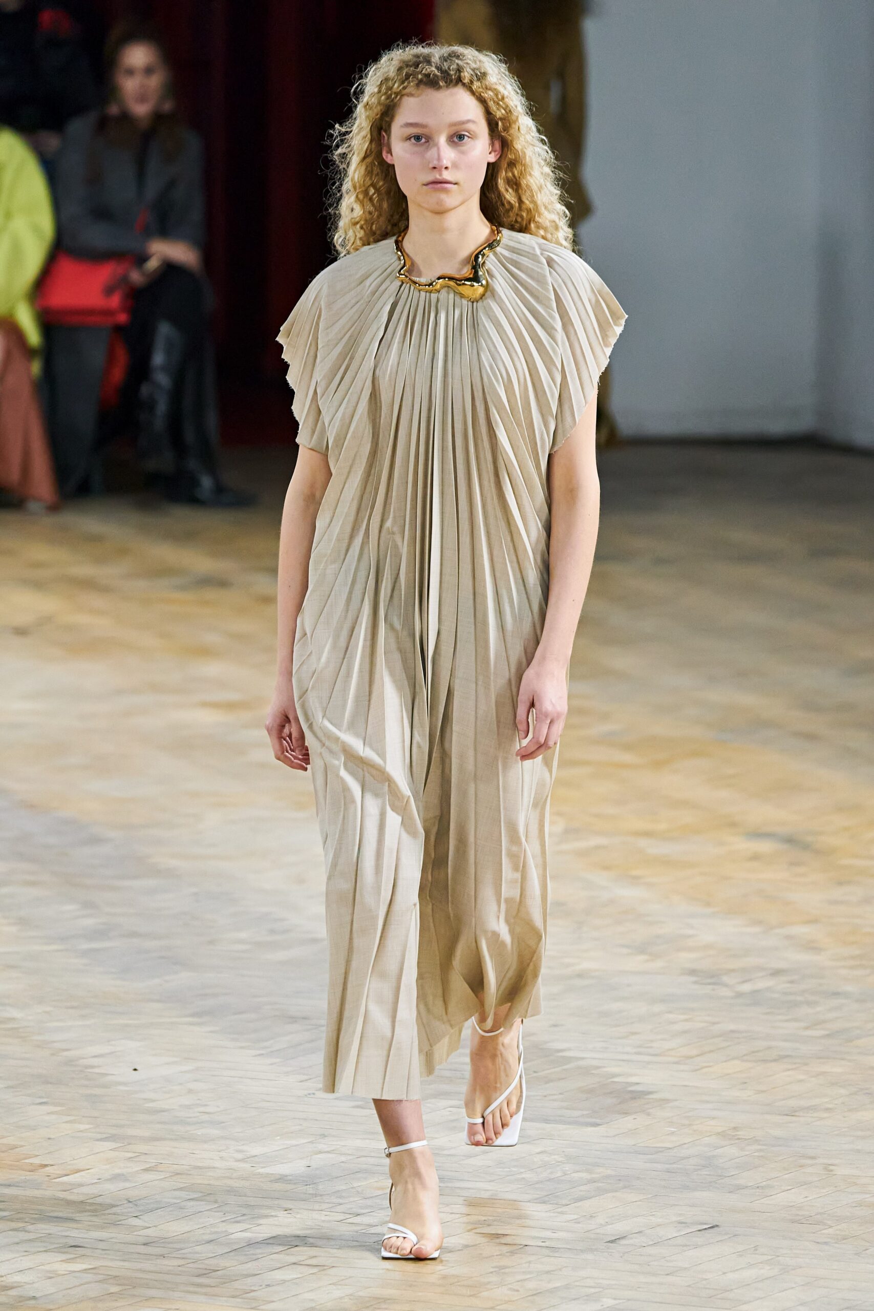 beige pleated sleeveless dress