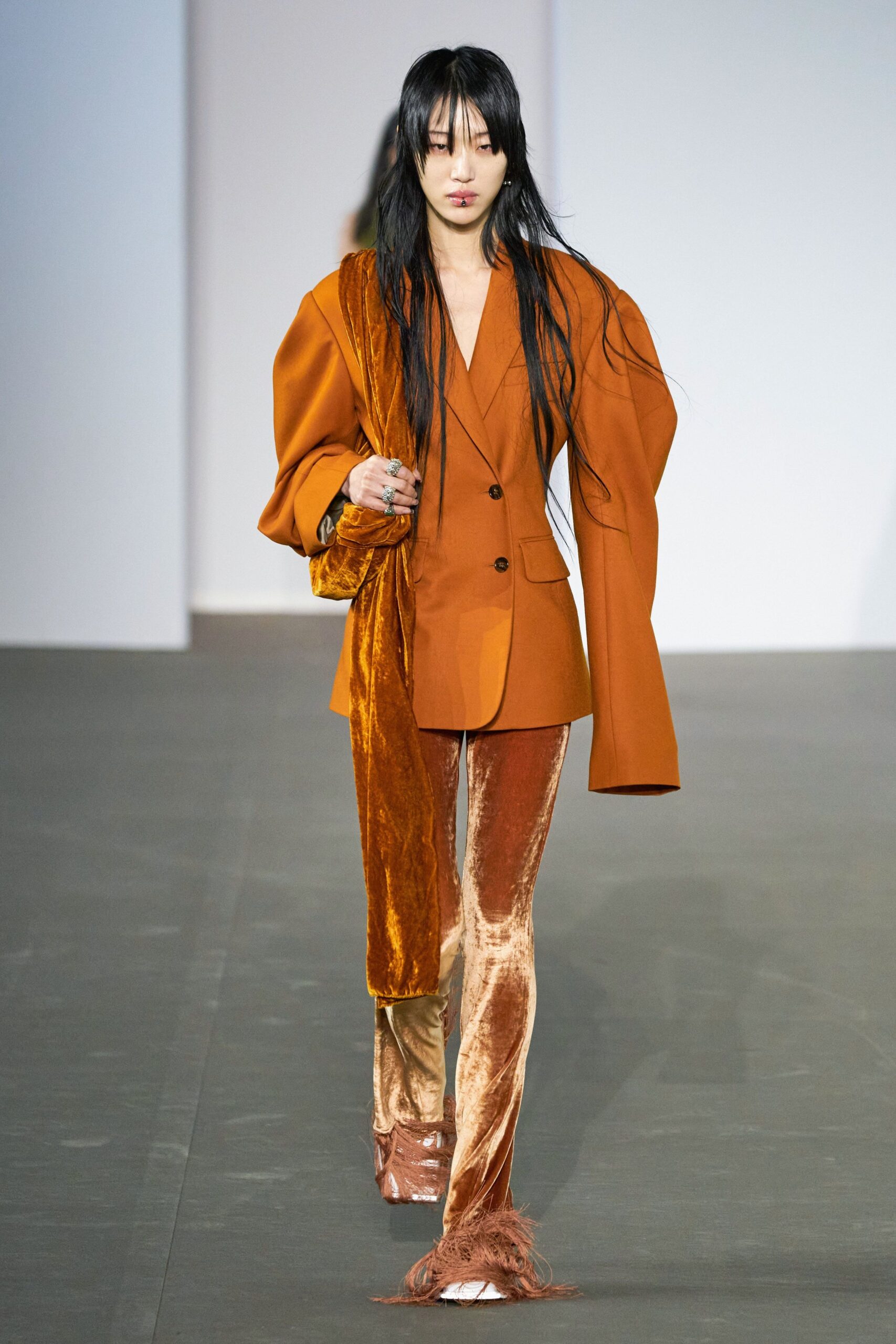 orange velvet tailored blazer and flared pants